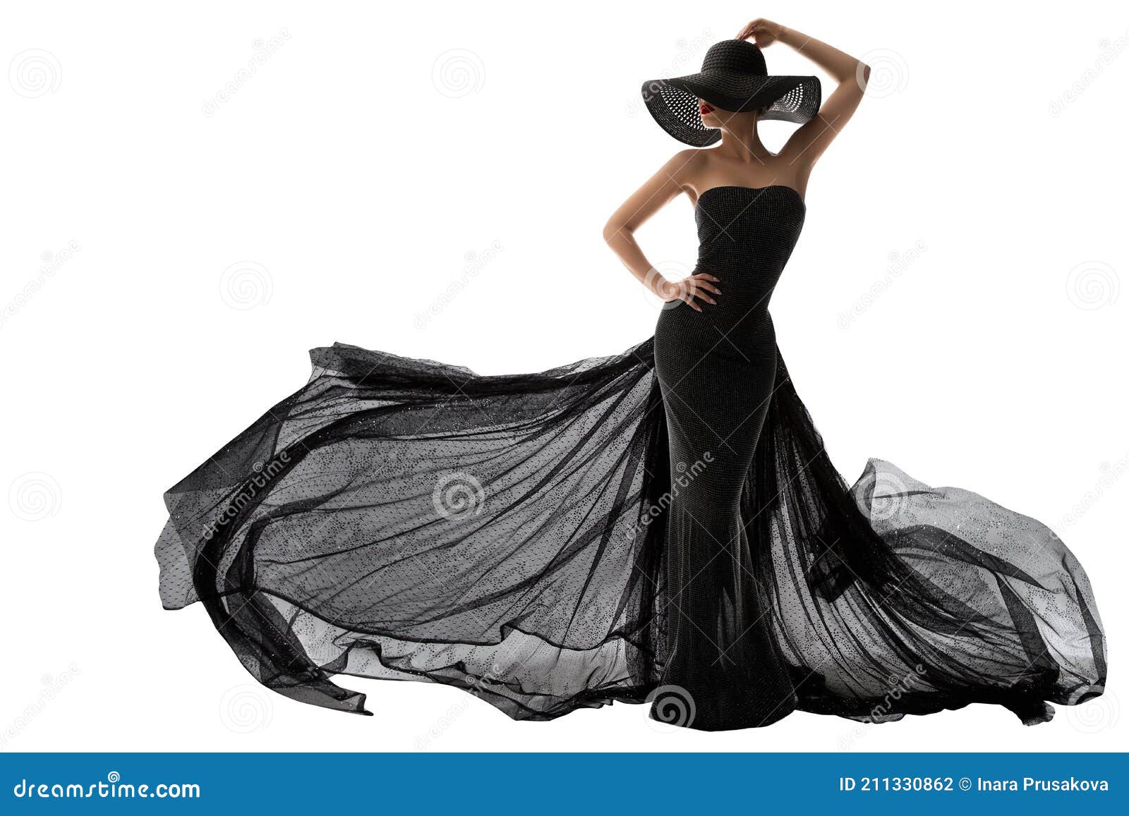 woman black dress fashion. elegant lady in hat. model silhouette in evening long black gown fluttering on wind.  white