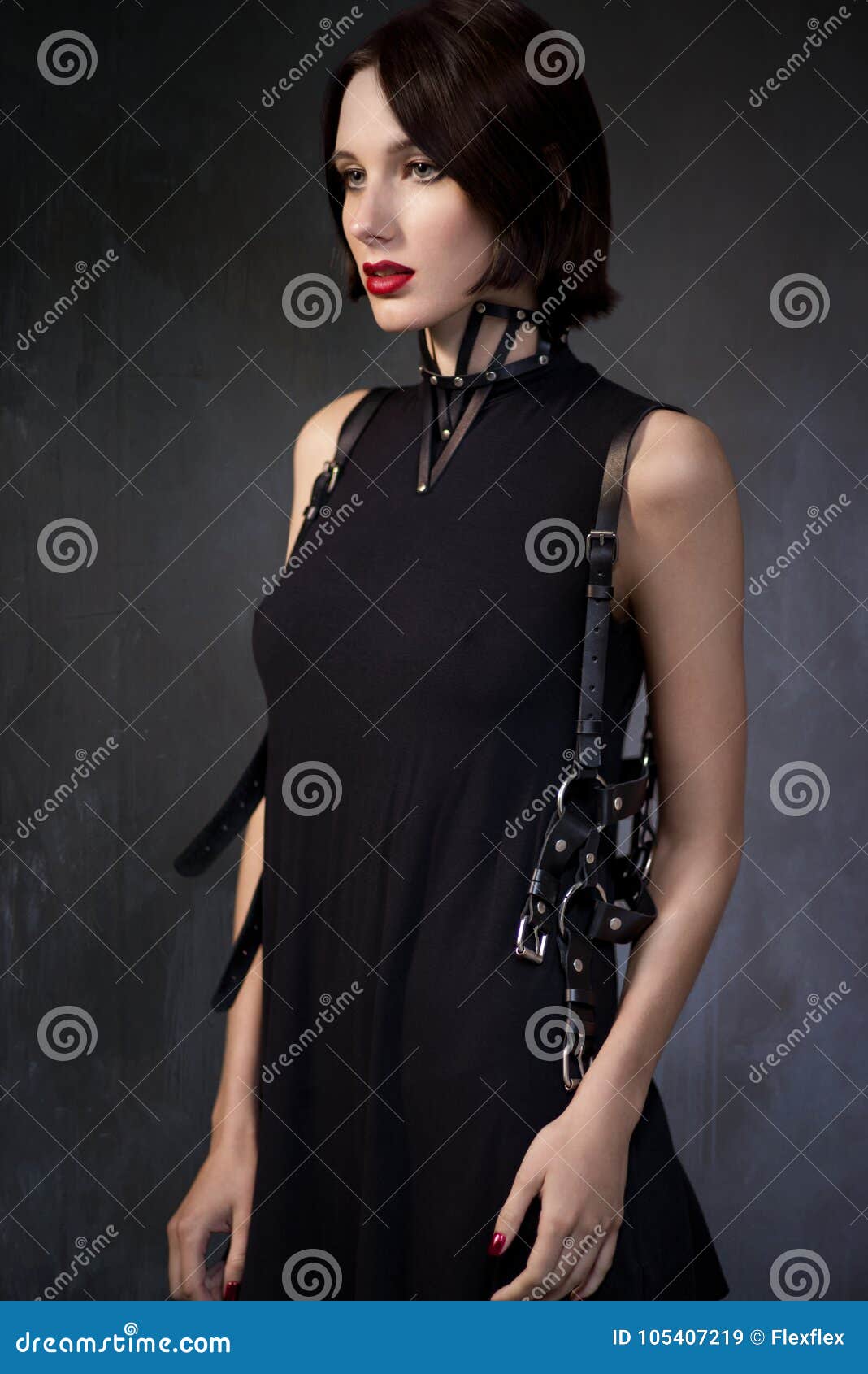 Woman In Black Dress With Leather Accessories Stock Image Image Of