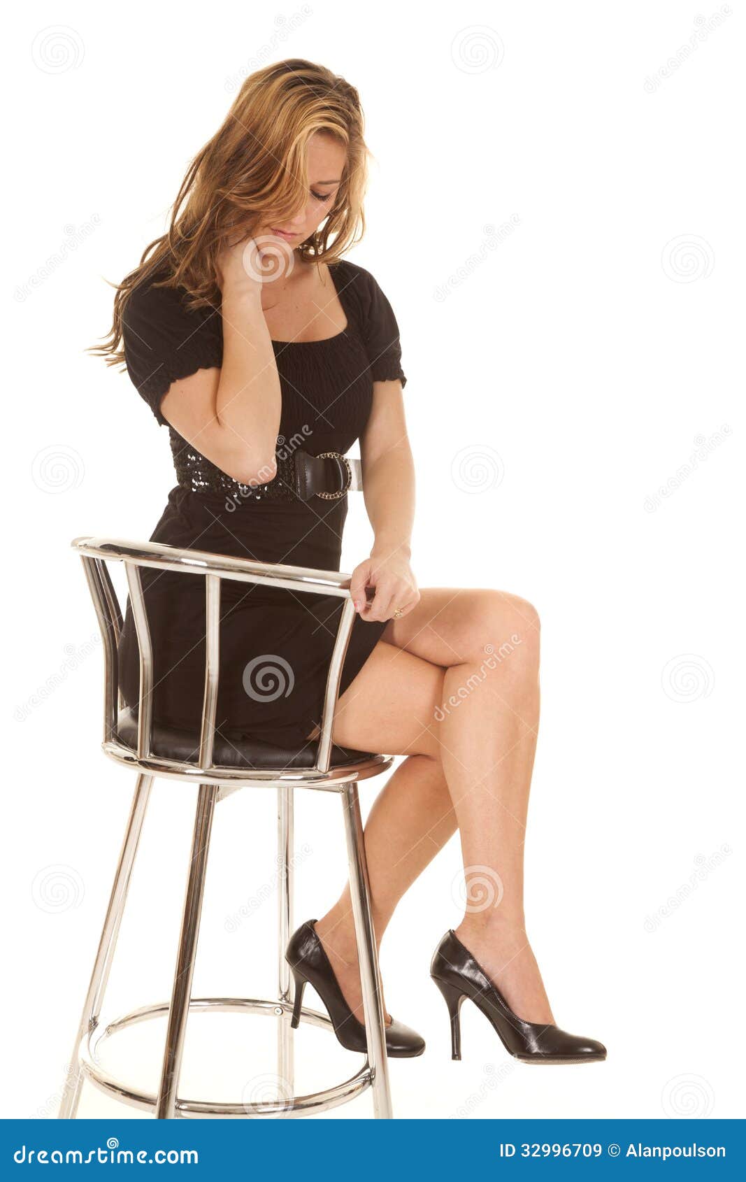 Woman In Black Dress Sitting On Chair Royalty Free Stock Images - Image