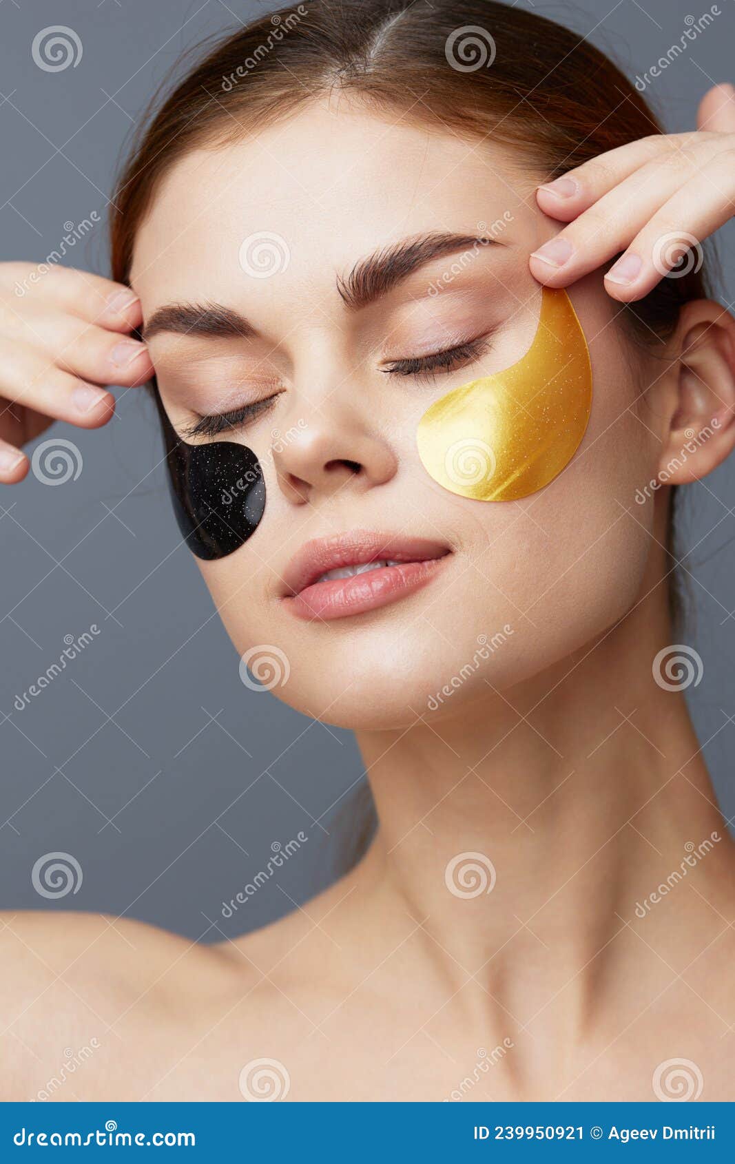 Woman Black And Gold Patches On The Face Gray Background Stock Image