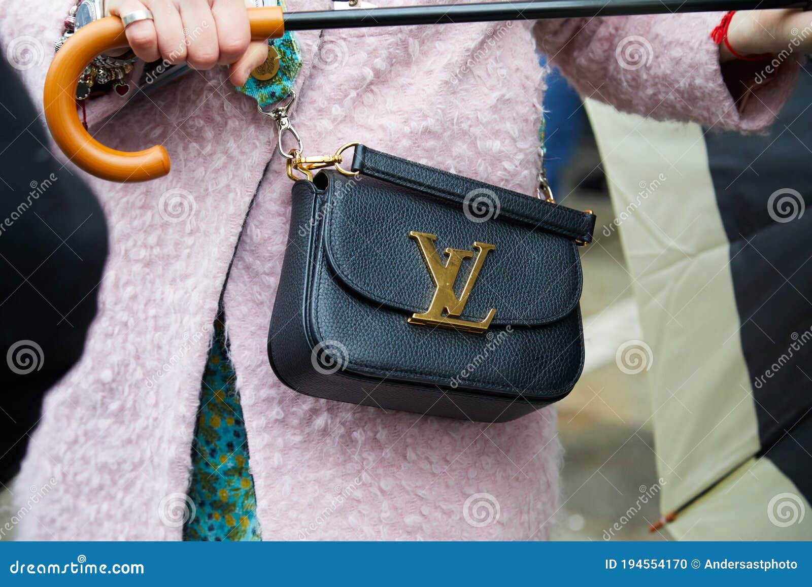 Woman with Black Leather Louis Vuitton Bag and Pink Coat before Max Mara  Fashion Show, Milan Fashion Week Editorial Image - Image of street,  bracelet: 194554170