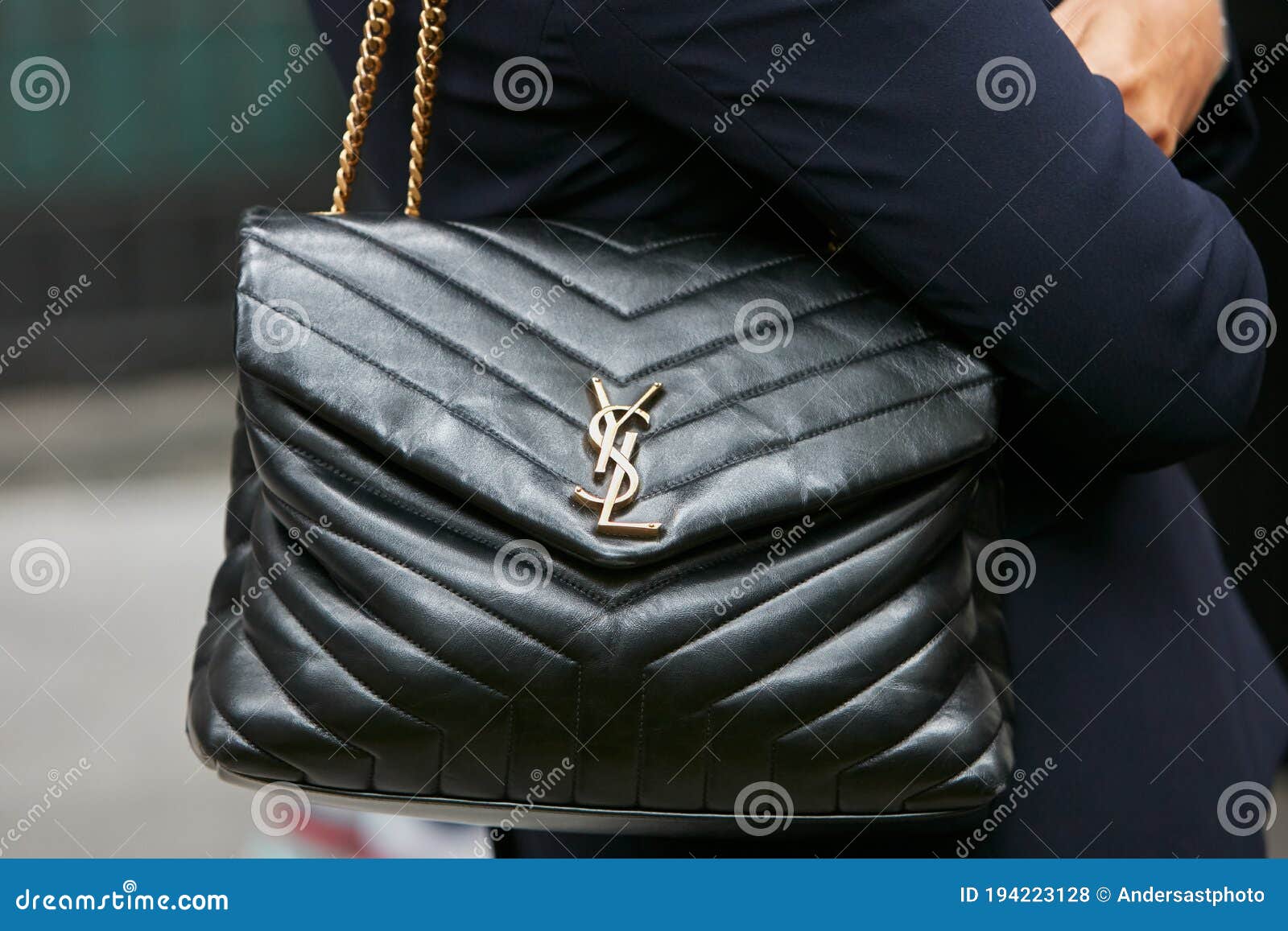 Woman with Black Leather Yves Saint Laurent Bag before Emporio Armani  Fashion Show, Milan Editorial Stock Photo - Image of yves, elegant:  194223128