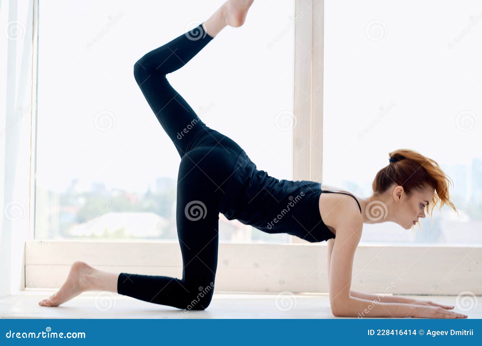 Woman in Black Tracksuit Yoga Near Exercise Window Stock Photo - Image ...