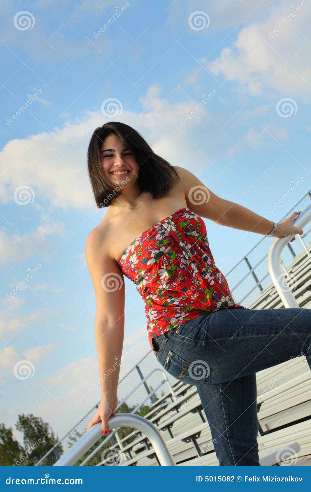 Woman On Bleachers Stock Photography Image 5015082