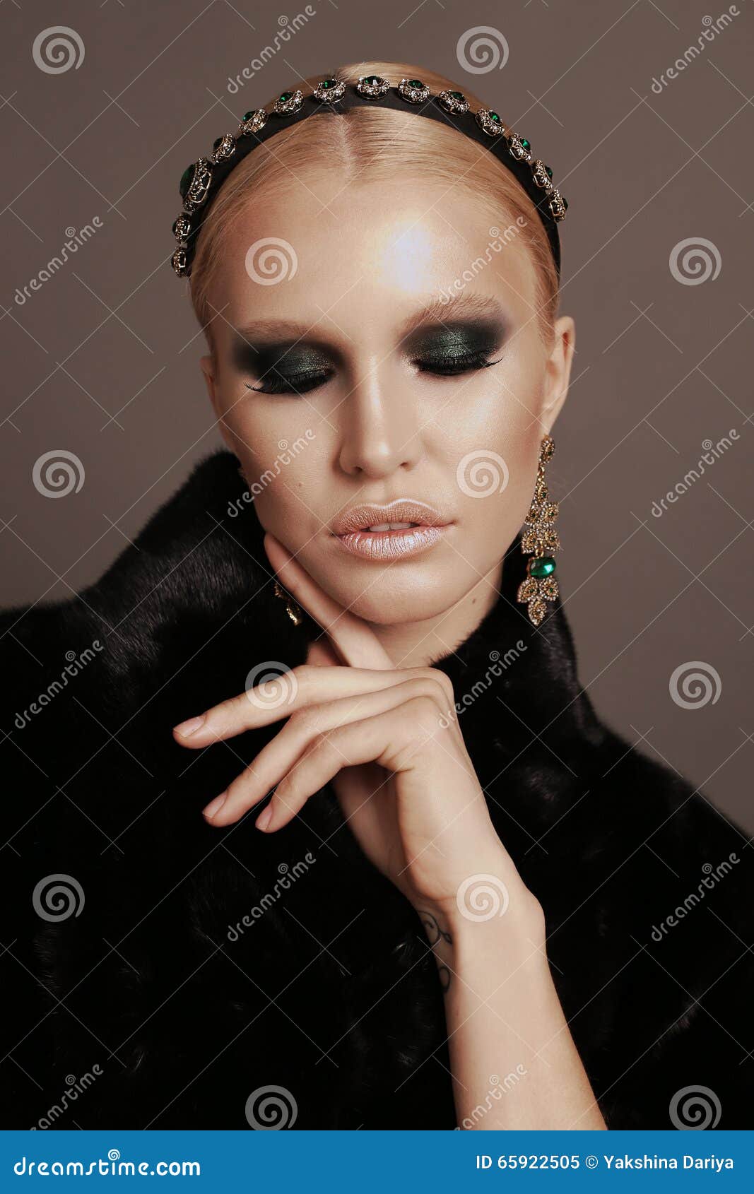 Woman with Blond Hair and Smokey Eyes Makeup,wears Luxurious Fur Coat ...