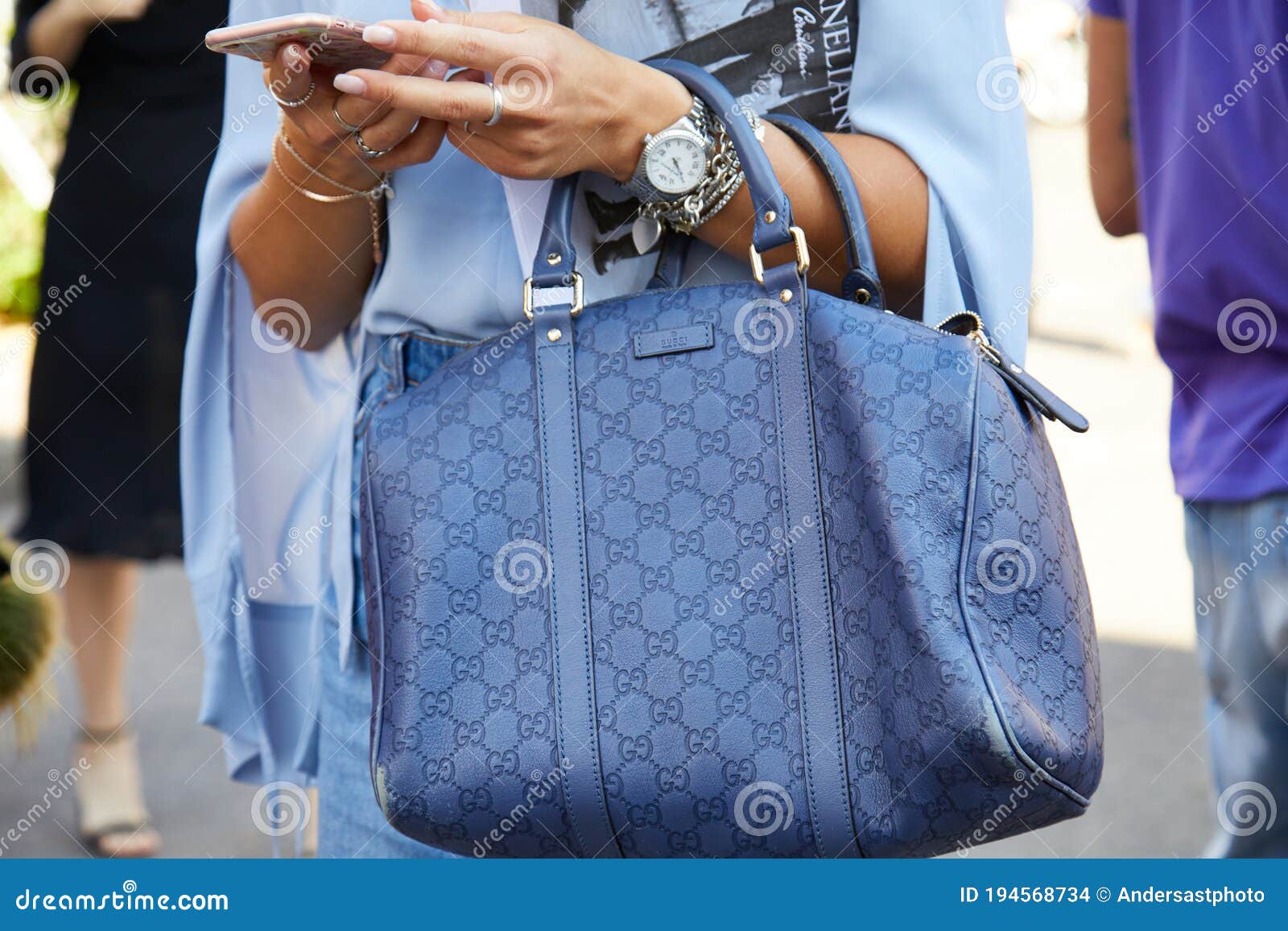 Woman With Blue Leather Gucci Bag Checking Smartphone Before Diesel Black Gold Fashion Show Milan Fashion Week Editorial Stock Image Image Of Technology Woman 194568734