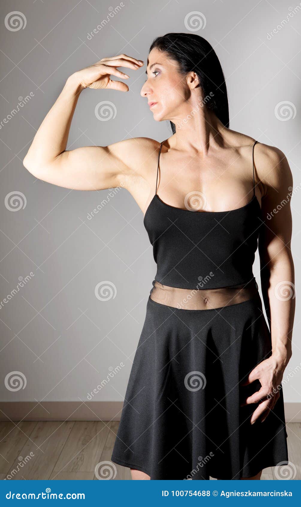 muscle woman in dress