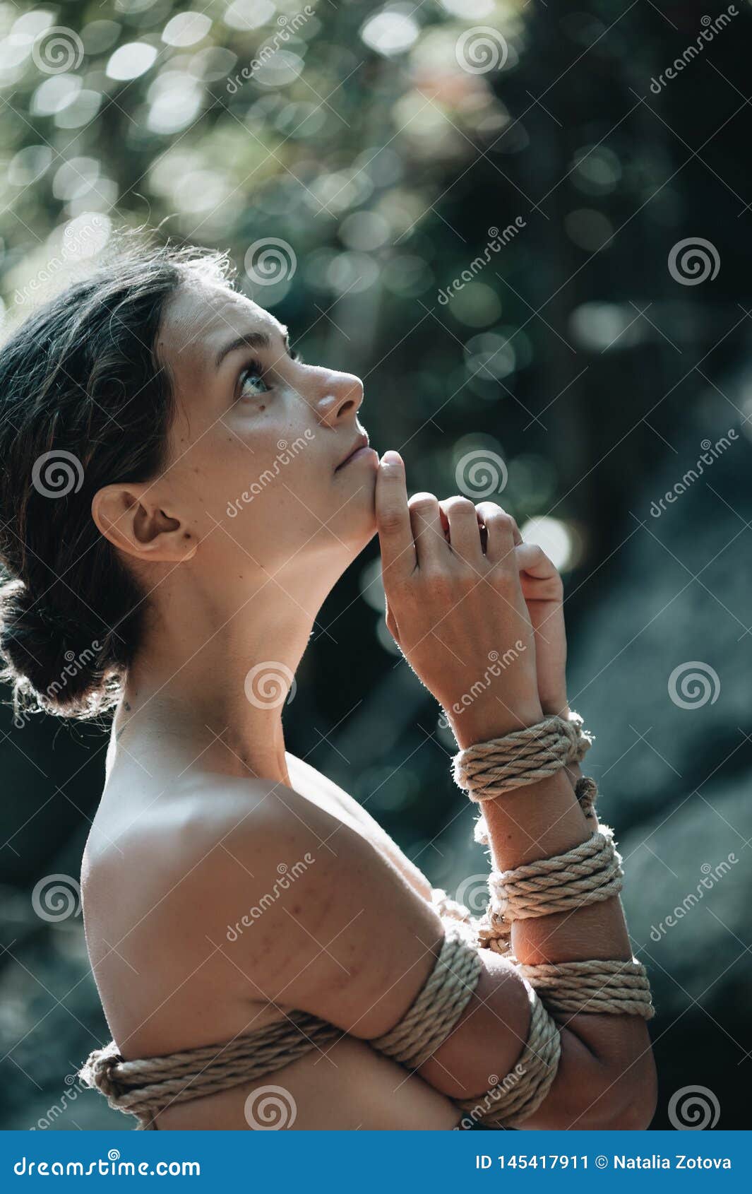 Woman Bound with a Rope in Japanese Technique Shibari Outdoors Stock Image  - Image of back, hand: 145417911