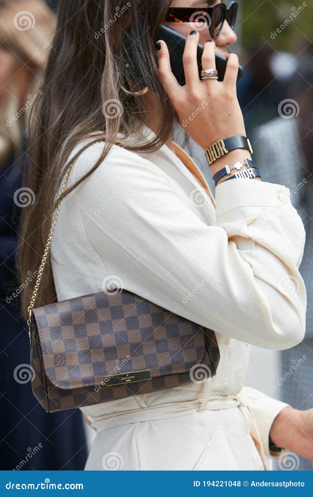 Woman with Brown Louis Vuitton Checkered Bag, White Dress and Dior