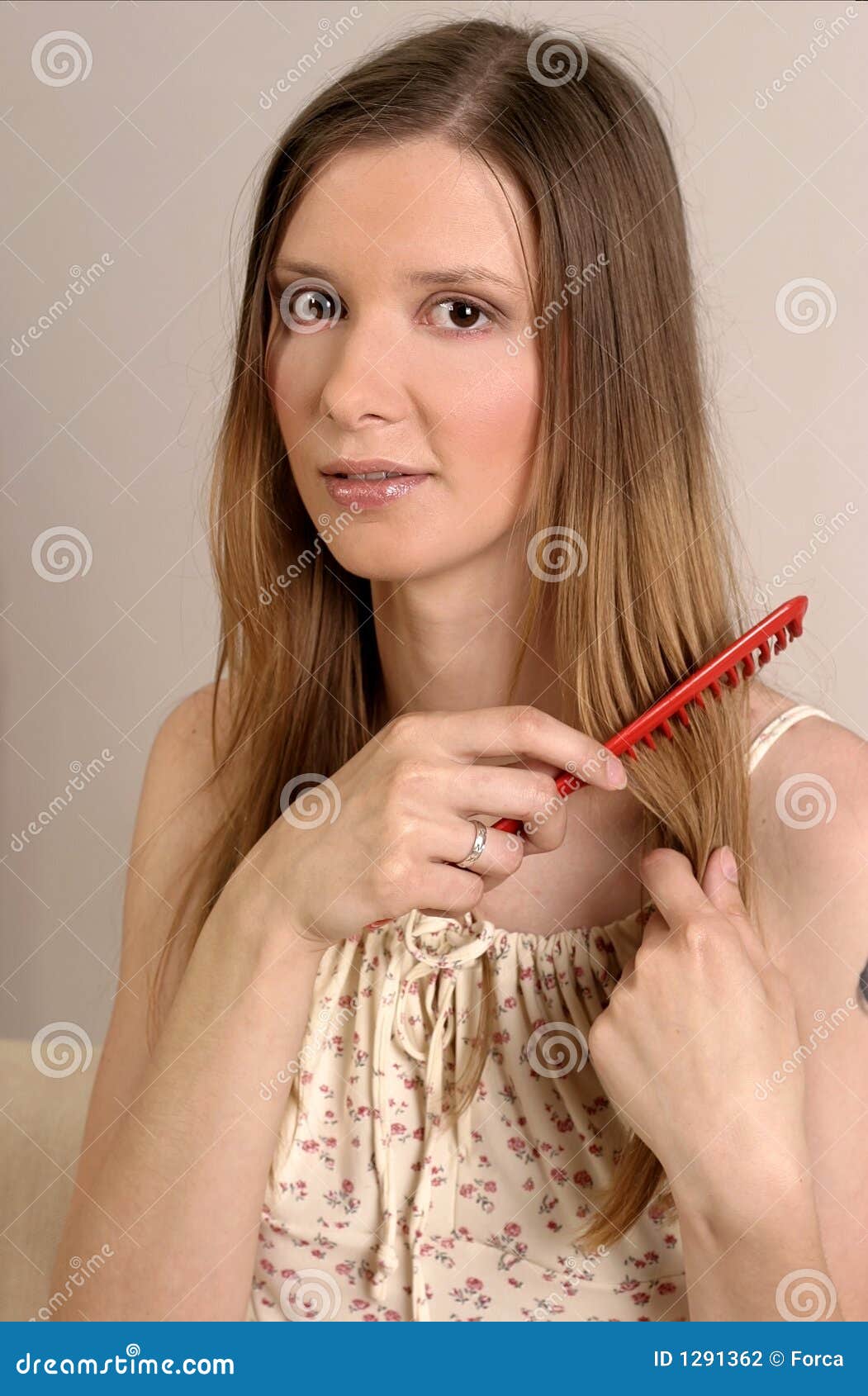 Woman brushing hair stock photo. Image of long, look, comb 1291362