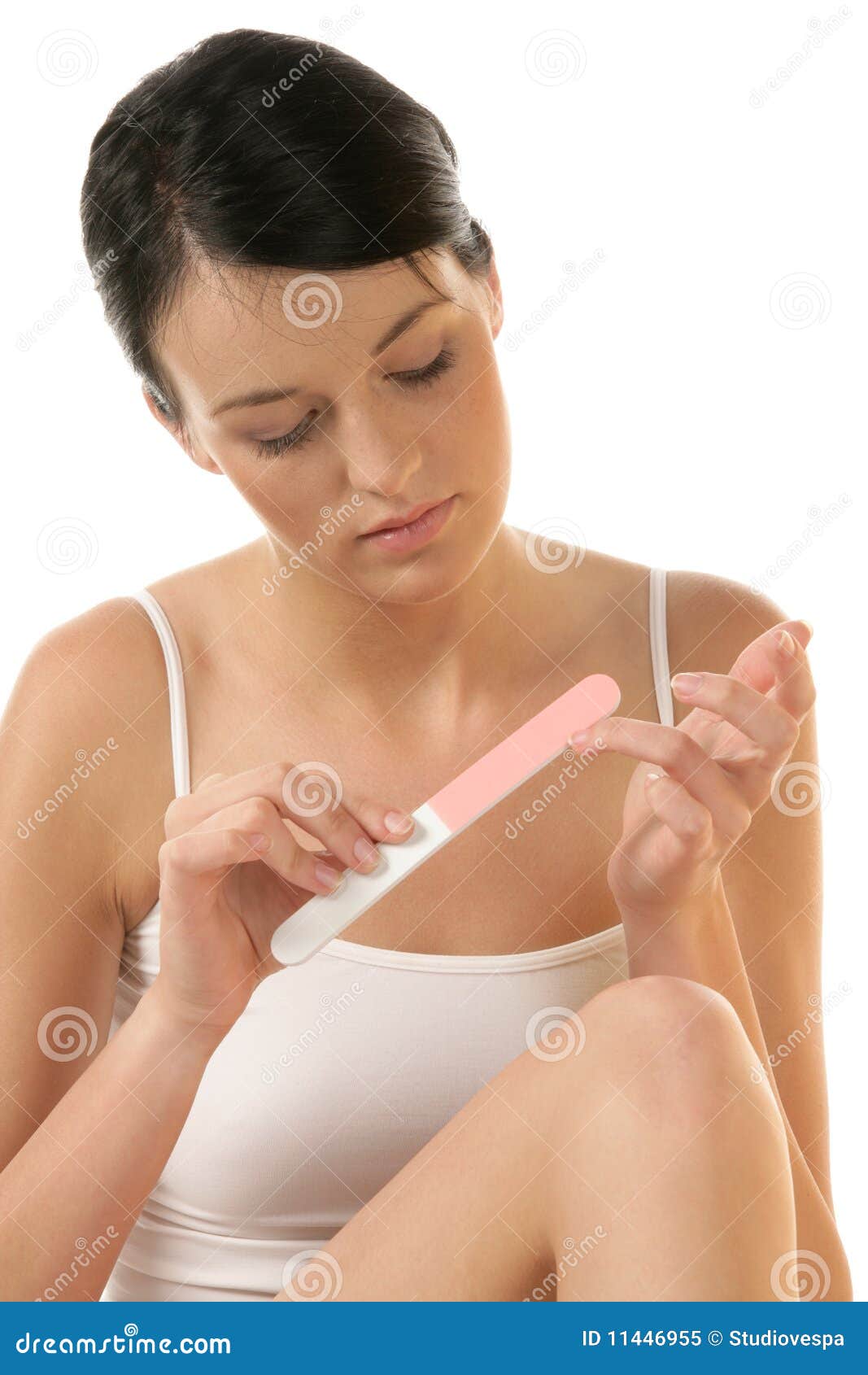 woman buffing her nails