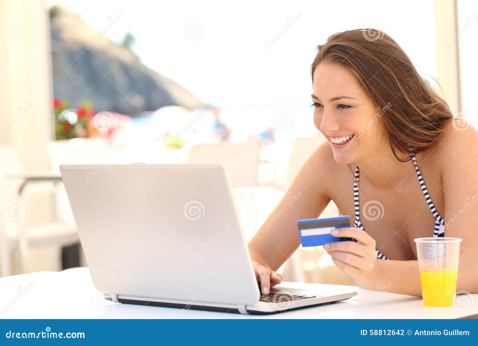 woman buying online on vacations
