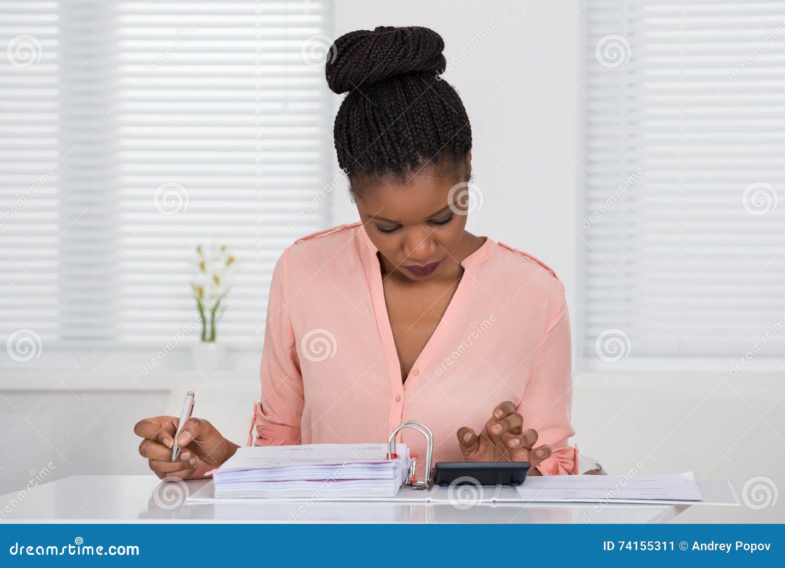 Woman Calculating Invoice With Calculator Stock Image Image Of Afro