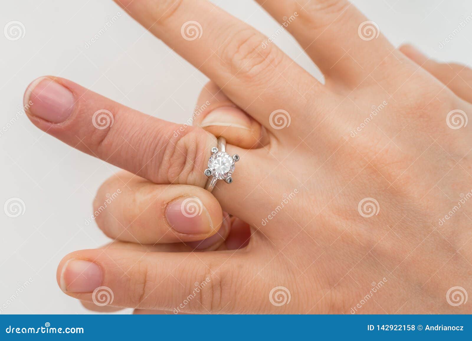 Woman Cannot Take Off Stuck Wedding Ring Stock Photo Image of ring
