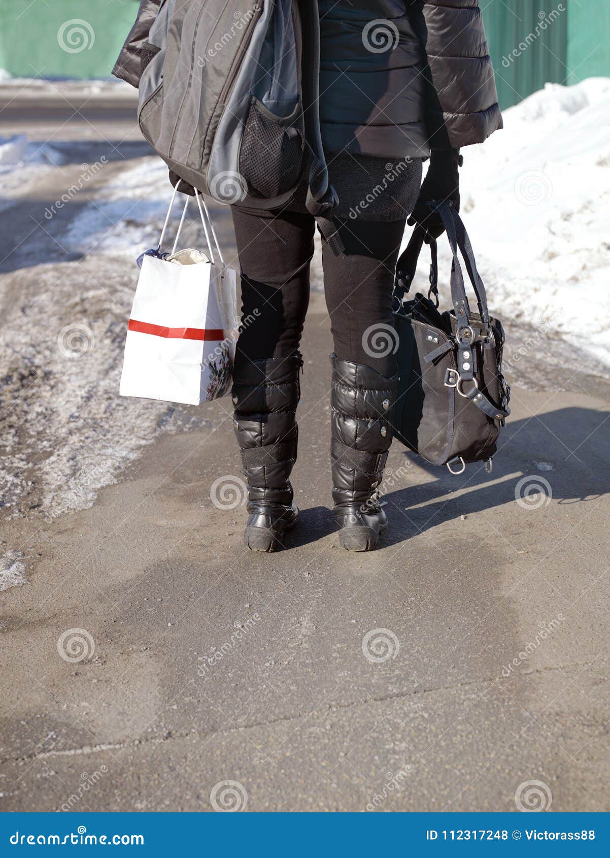 Woman Carrying Bags stock photo. Image of clothes, asphalt - 112317248