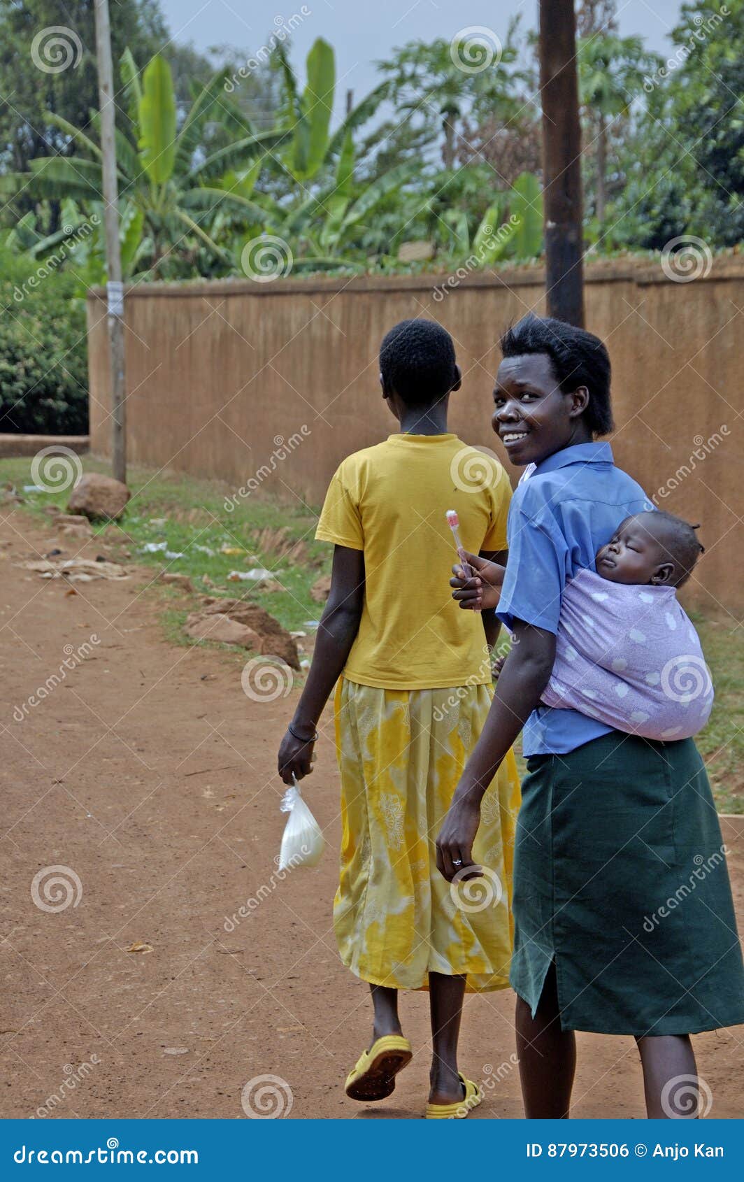 Woman carrying her child editorial photo. Image of african - 87973506