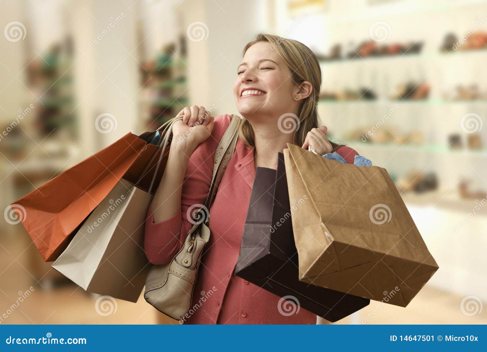 woman carrying shopping bags