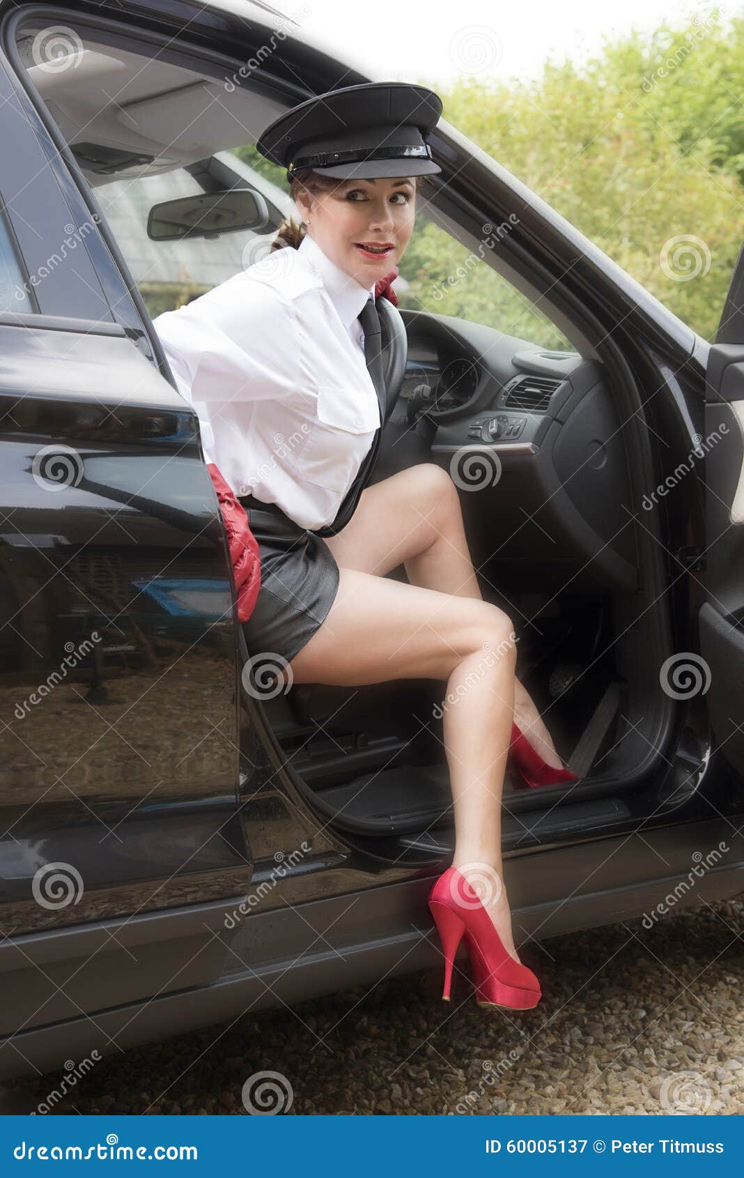 Woman Chauffeur With Legs Stock Image 60005209 