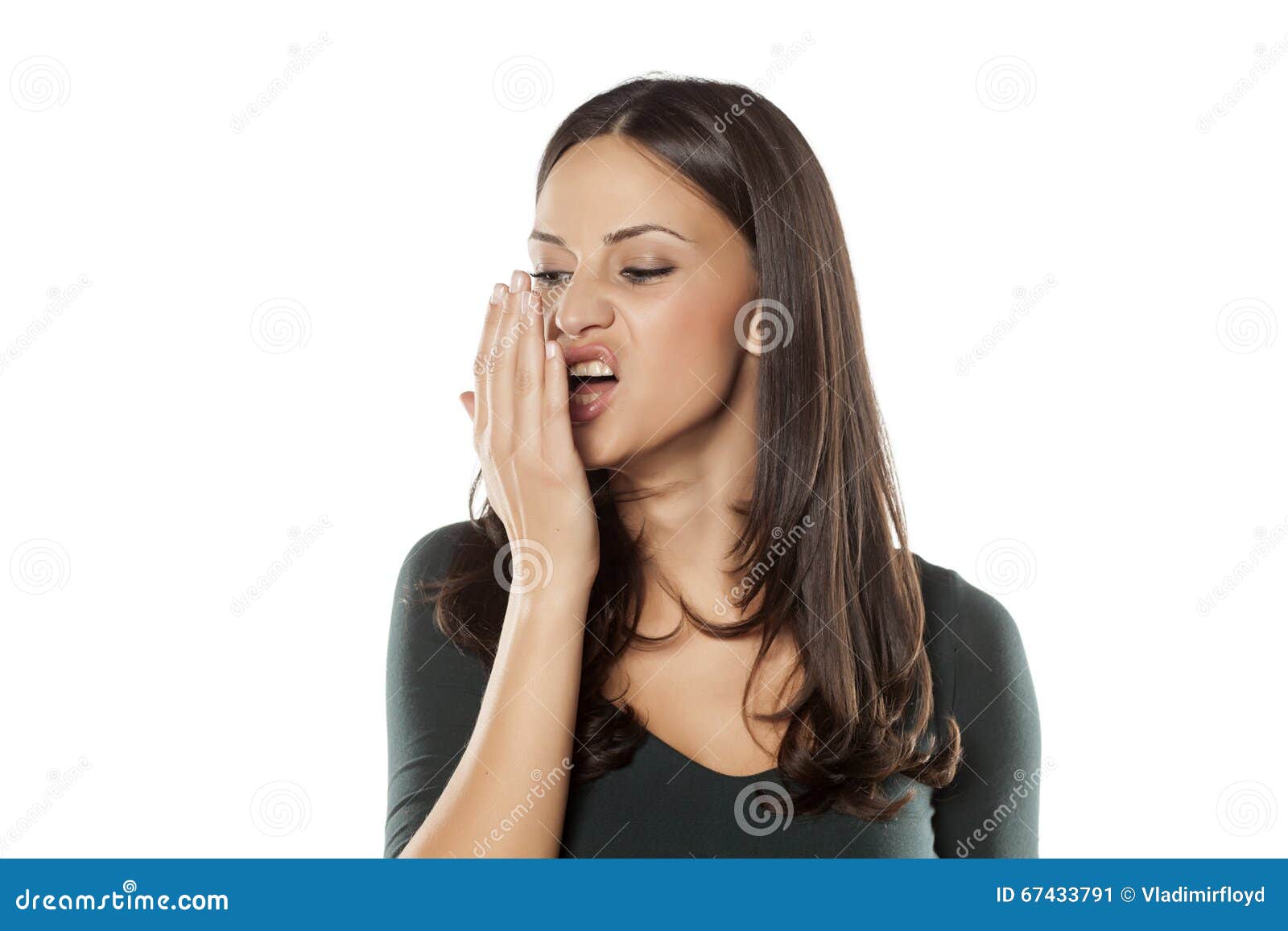 Woman checking her breath stock image. Image of pretty 67433791