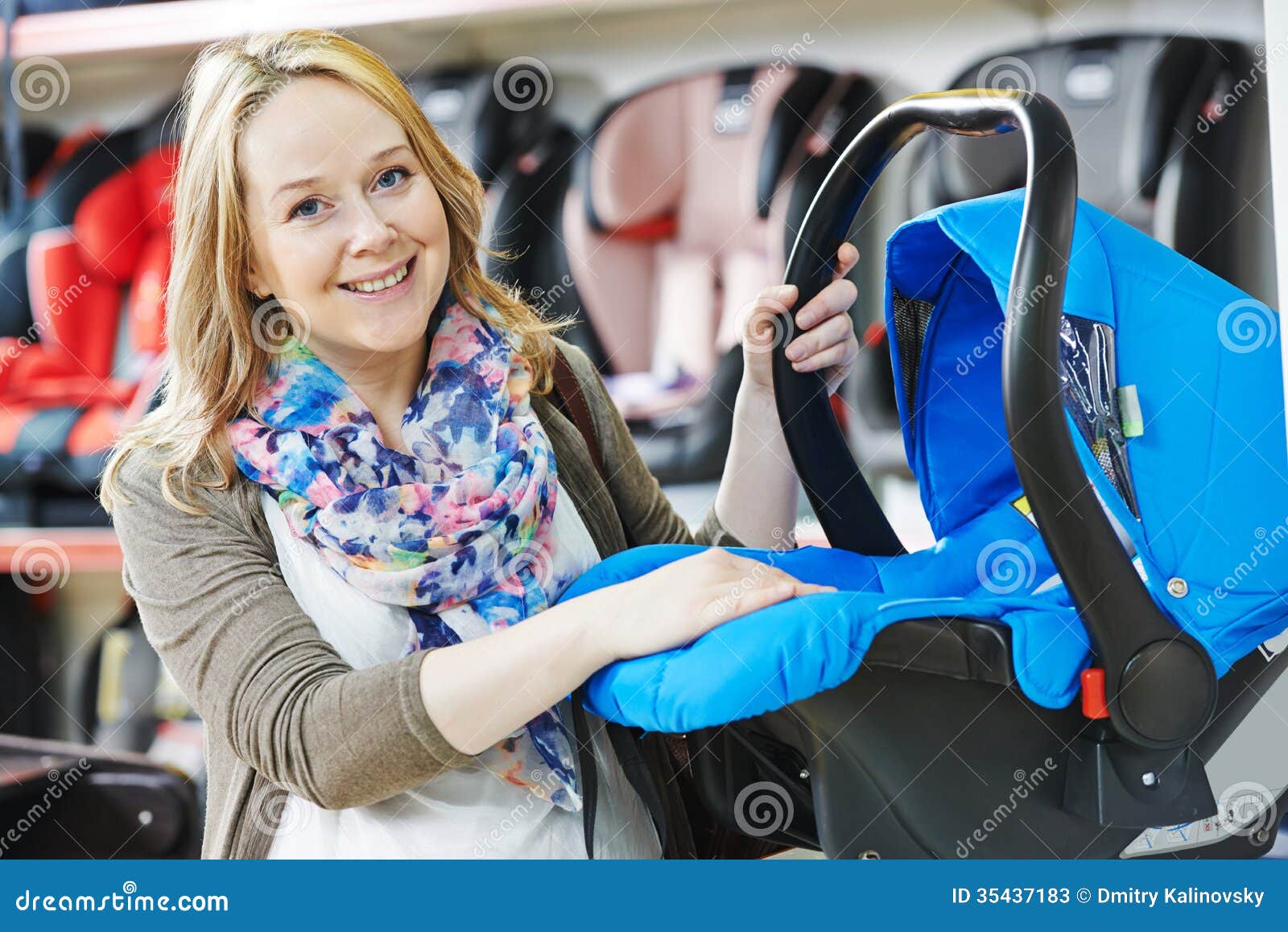 woman choosing child car seat