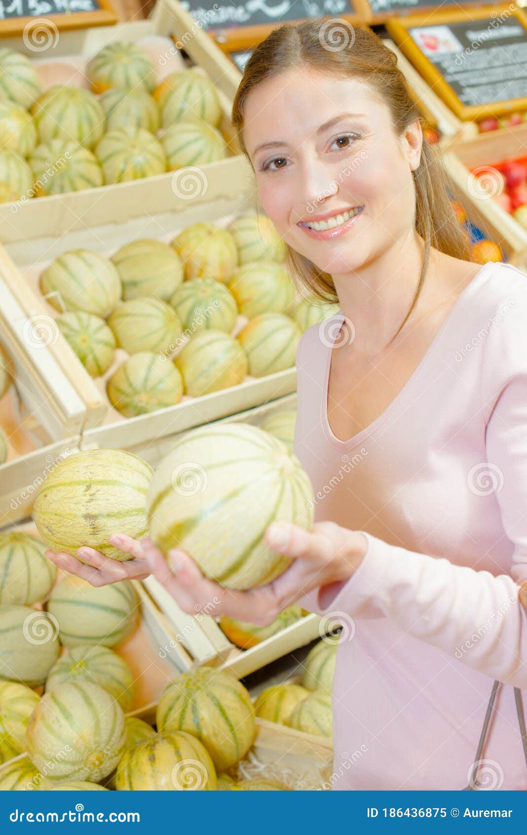 Woman choosing melon stock image. Image of foreground 186436875