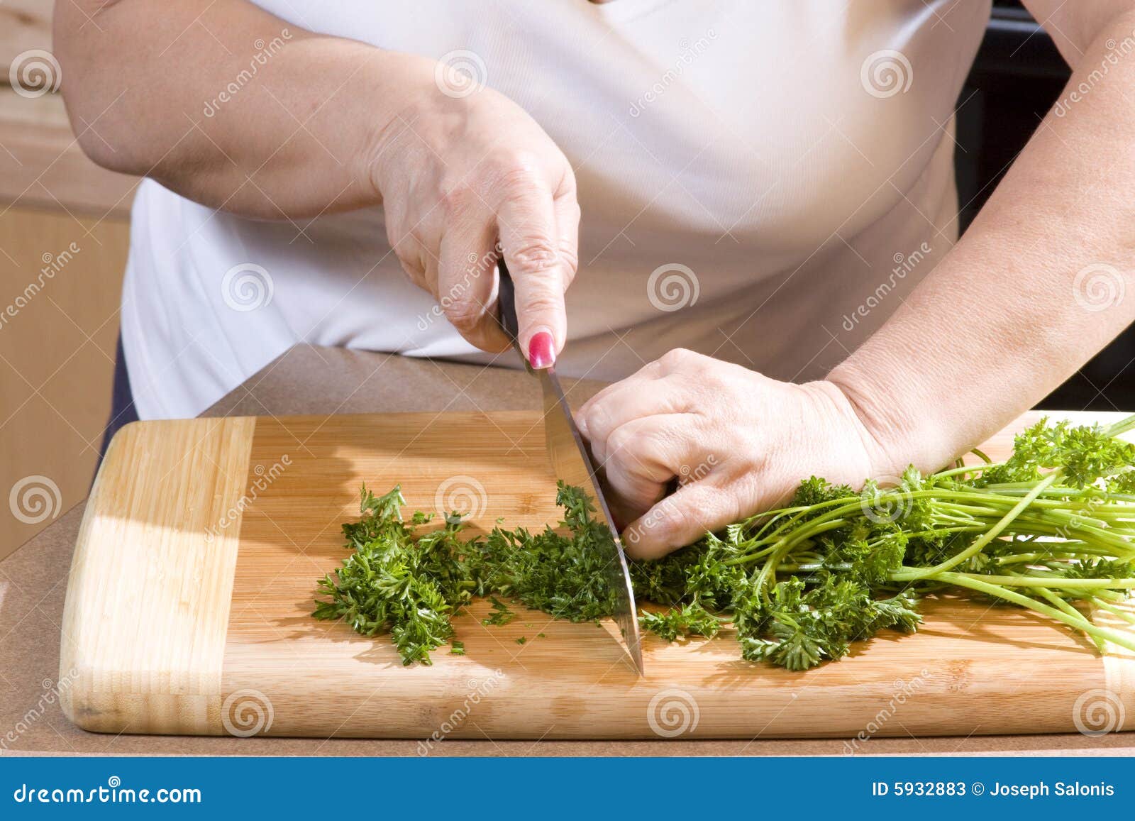 Woman Chopping Parsley in Kitchen Stock Image Image of oven, pink