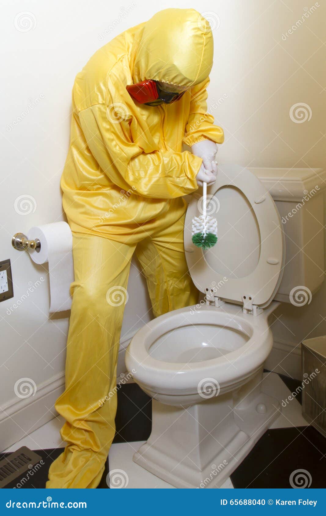 woman cleaning haz mat toilet