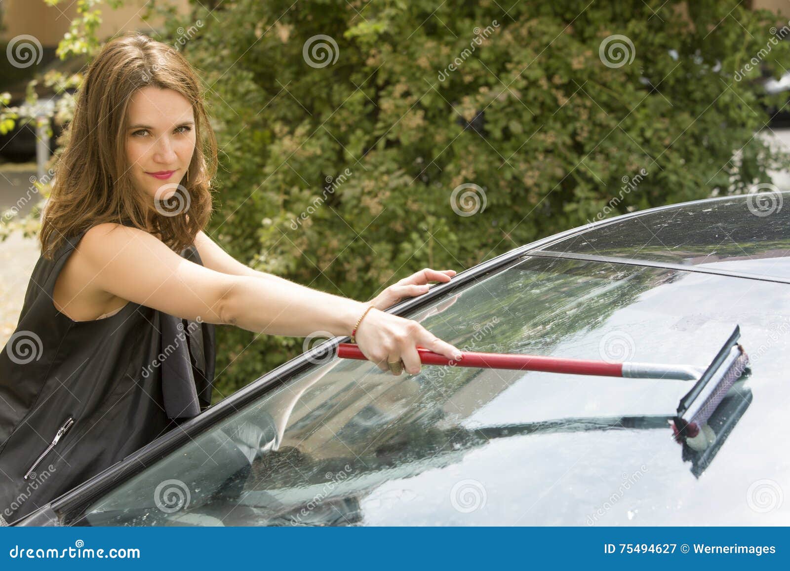 Woman Cleaning the Windshield of Her Car Stock Image Image of dirt