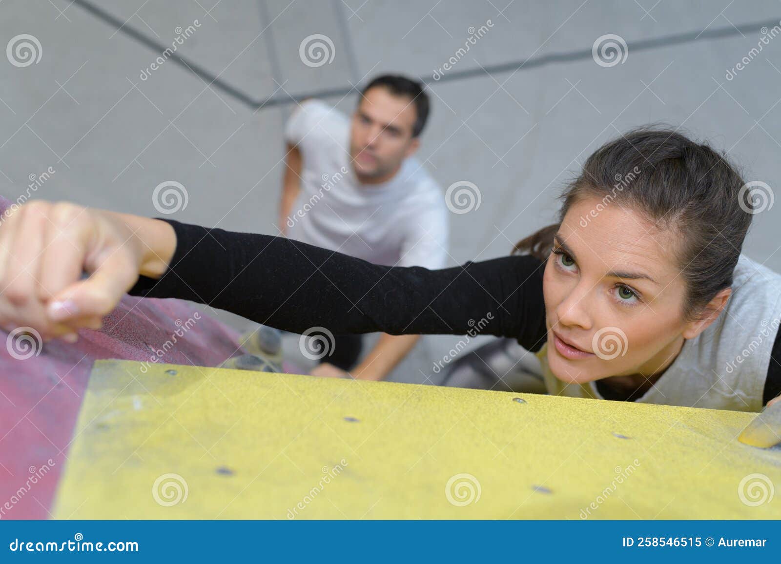Woman climbing wall stock image. Image of climber, moving 258546515