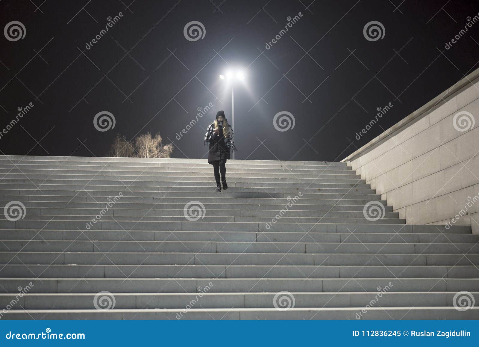 The Woman Down the Stairs Under the Street Lights Stock Image - Image