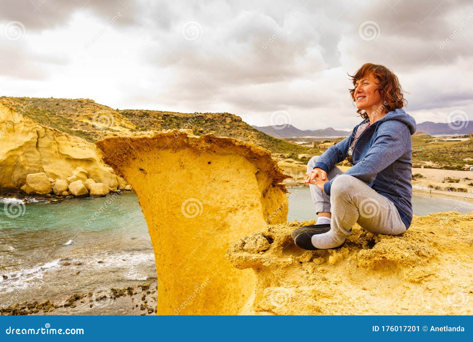 woman on cocedores beach, spain