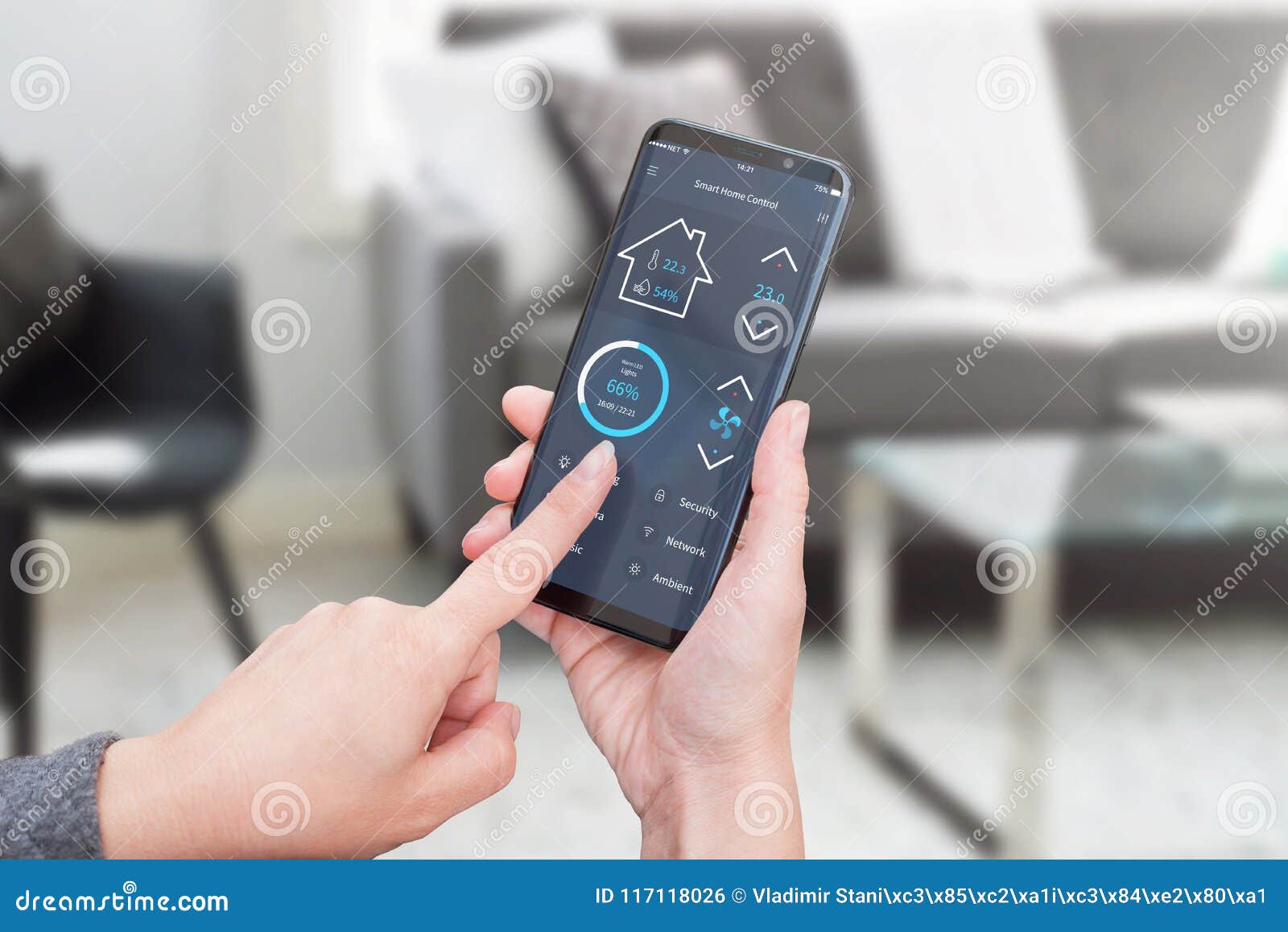 woman control light in living room interior with smart home control app on modern mobile devices