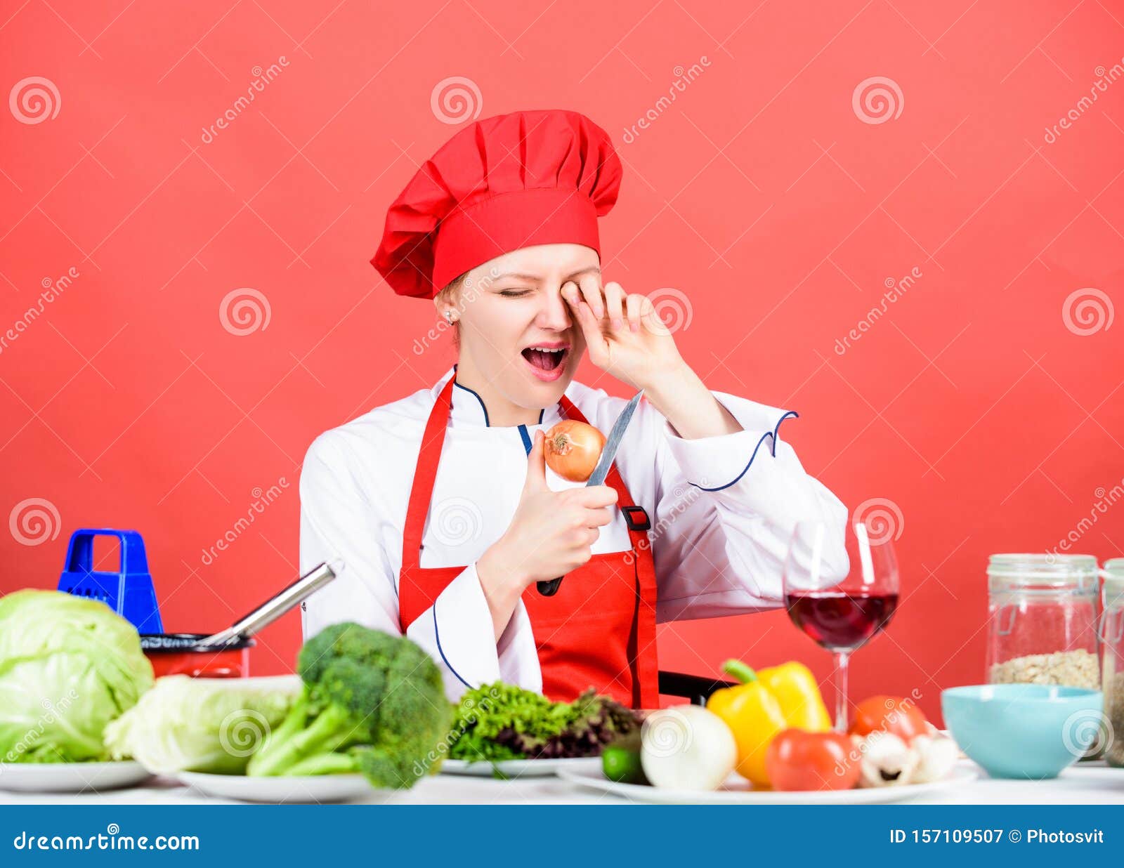 Woman in Cook Hat Crying because of Onion. Professional Chef on Red ...