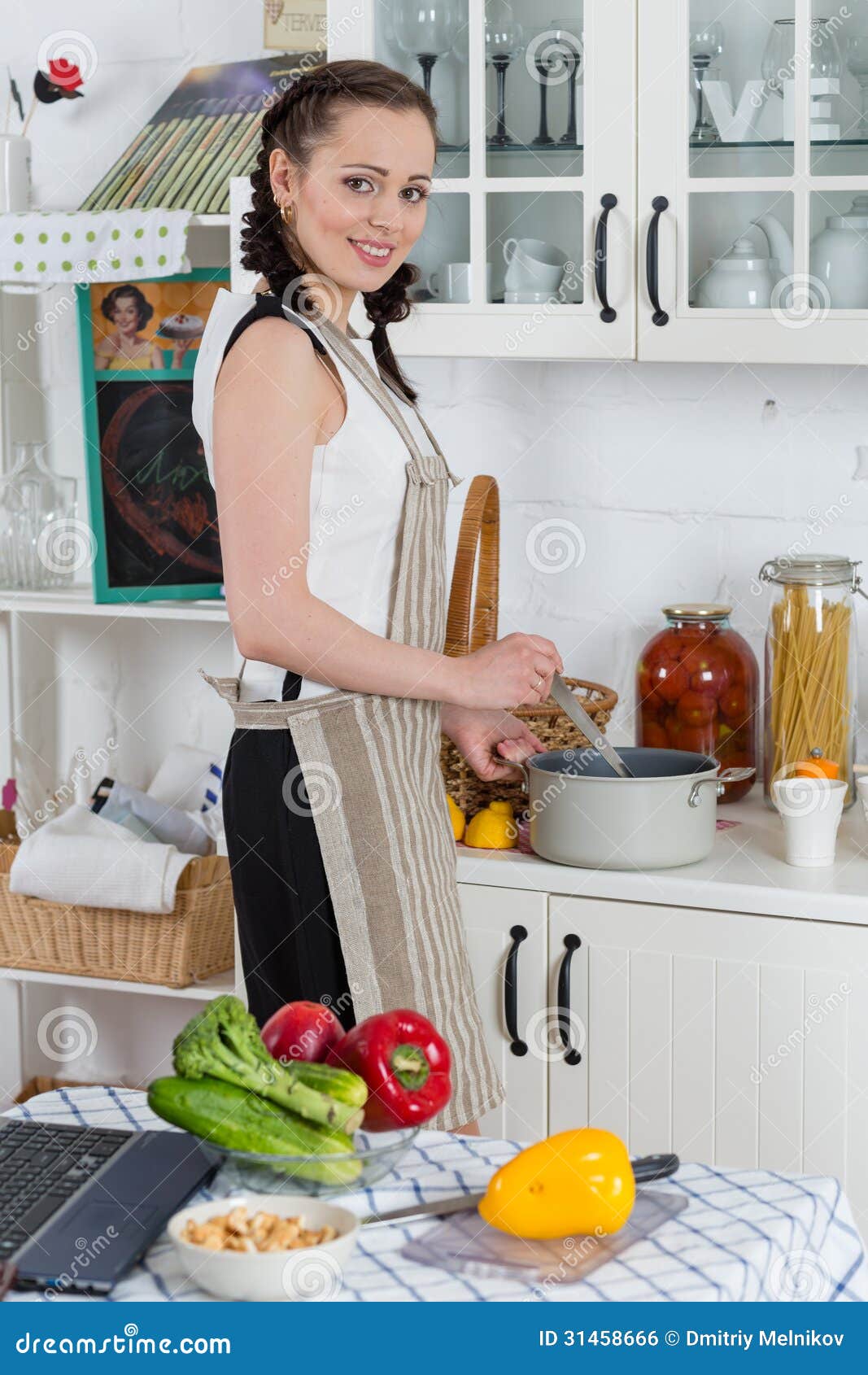 Woman Cooking Food In The Kitchen Royalty Free Stoc