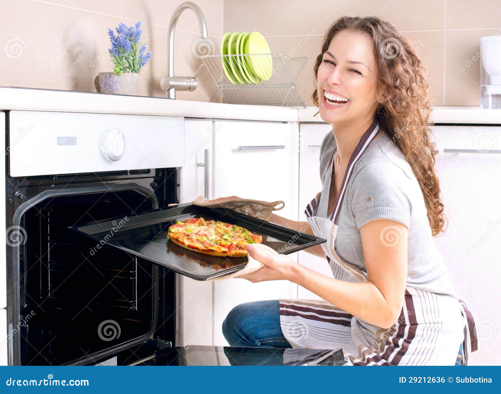 woman cooking pizza