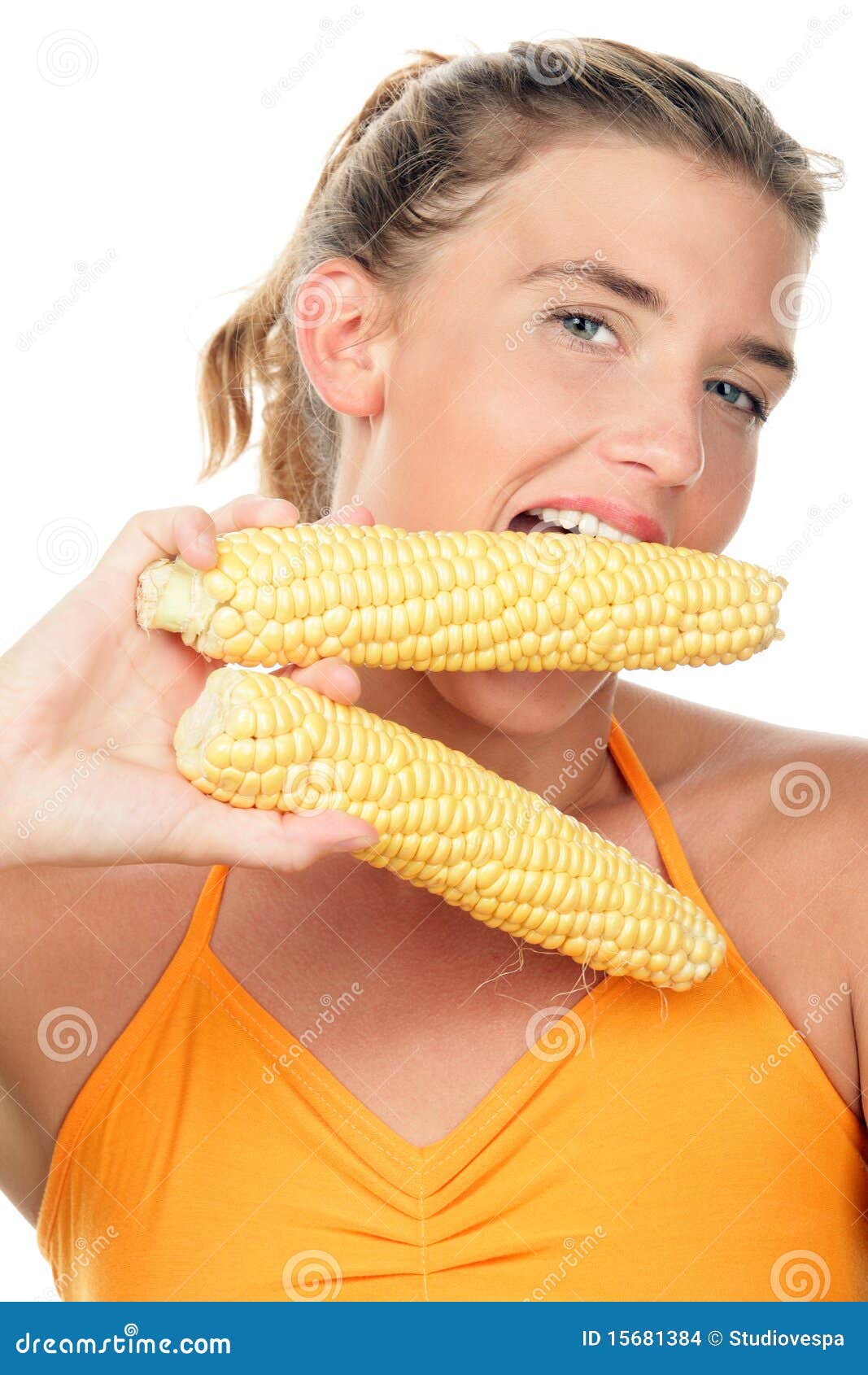 woman with corn cobs