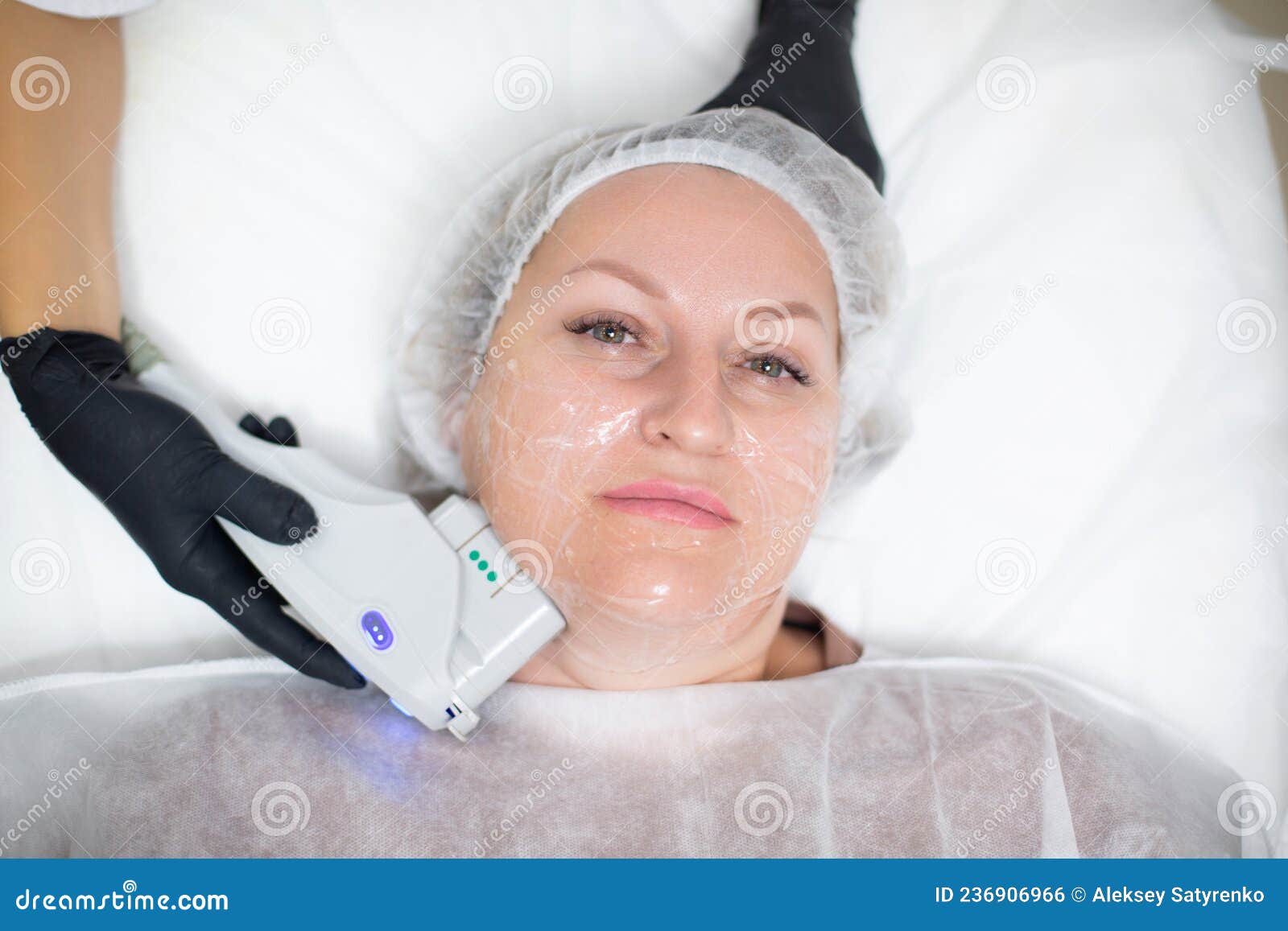 A Woman In A Cosmetology Office Receives A Smas Lifting Procedure Non