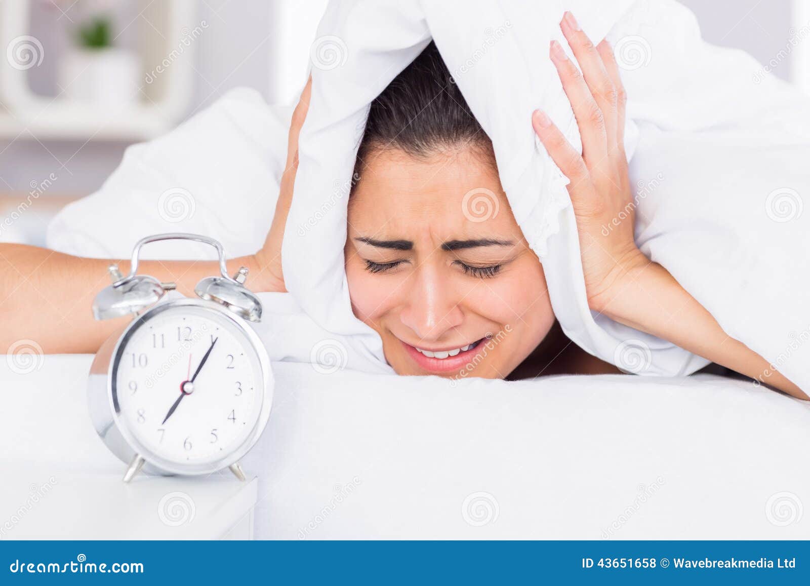 Woman Covering Ears with Sheet in Bed Stock Photo Image of head