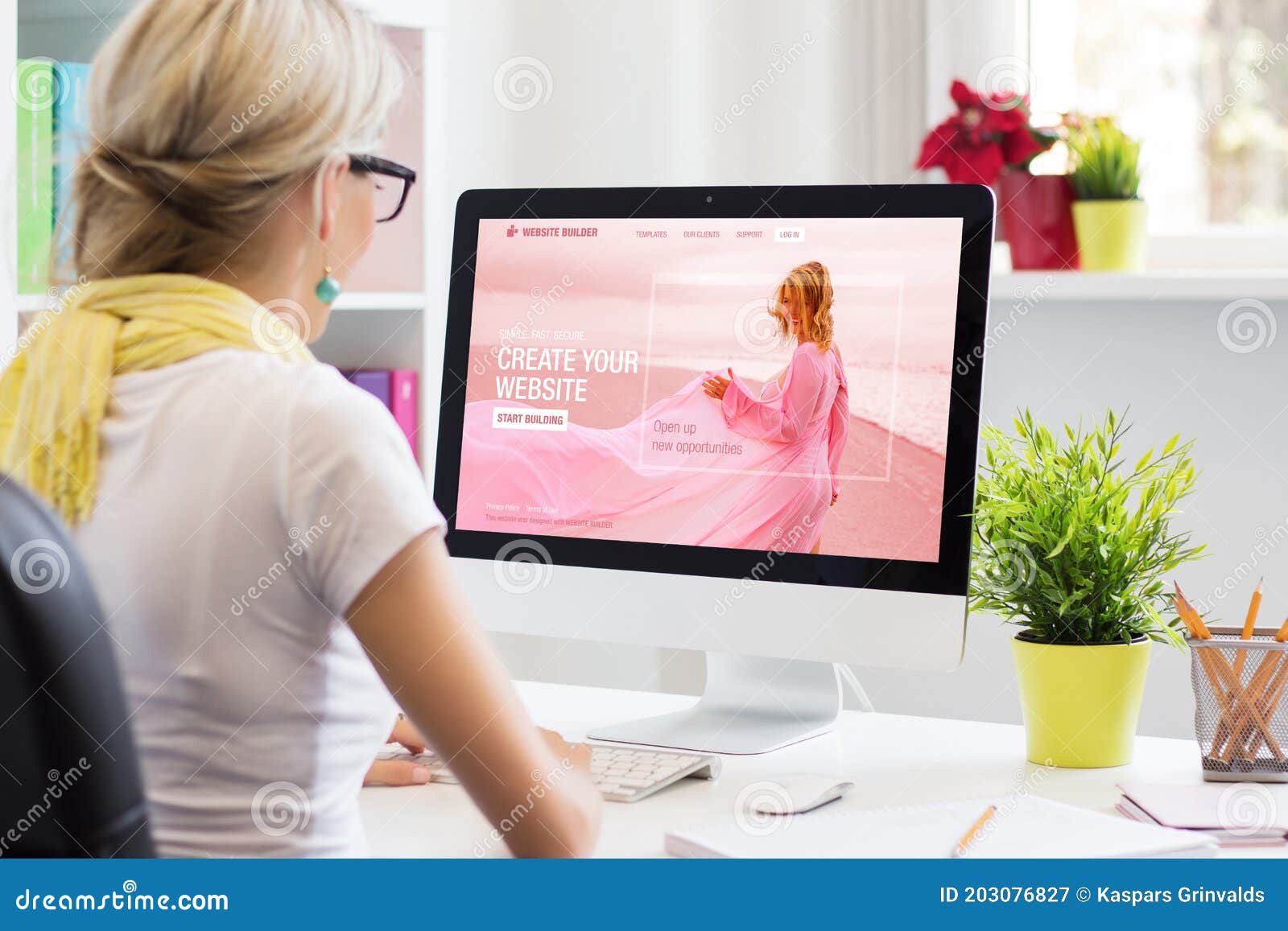woman creating her own website on computer