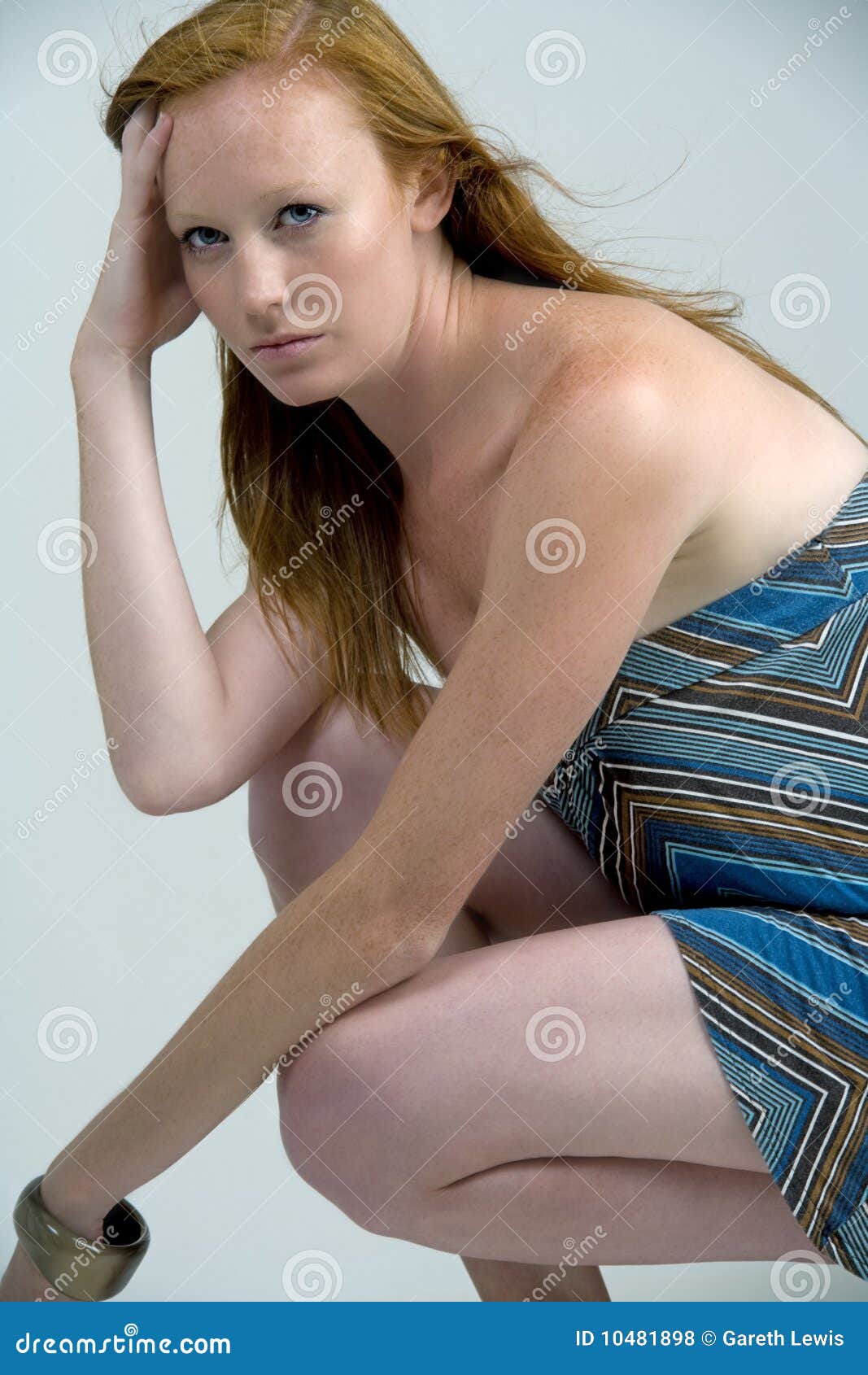 Woman crouching down stock photo. Image of dress, model - 10481898