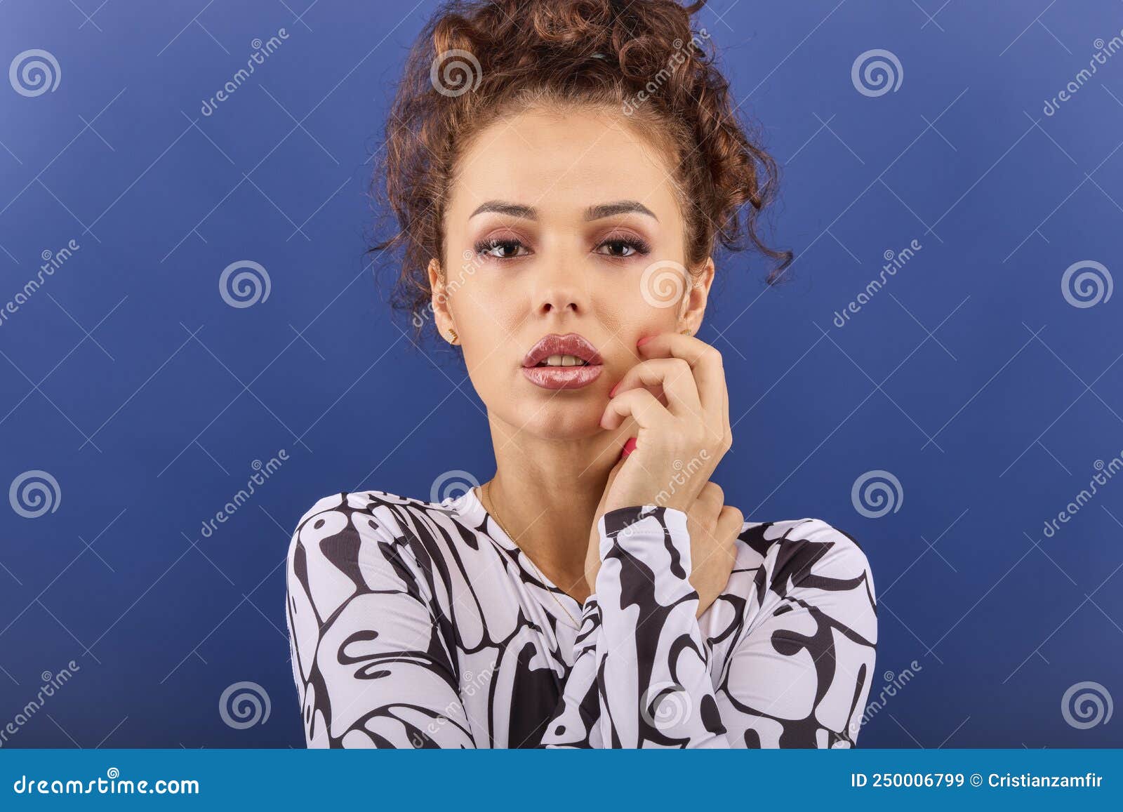 Woman With Curly Hair Poses In Different Positions On A Blue Background Stock Image Image Of 
