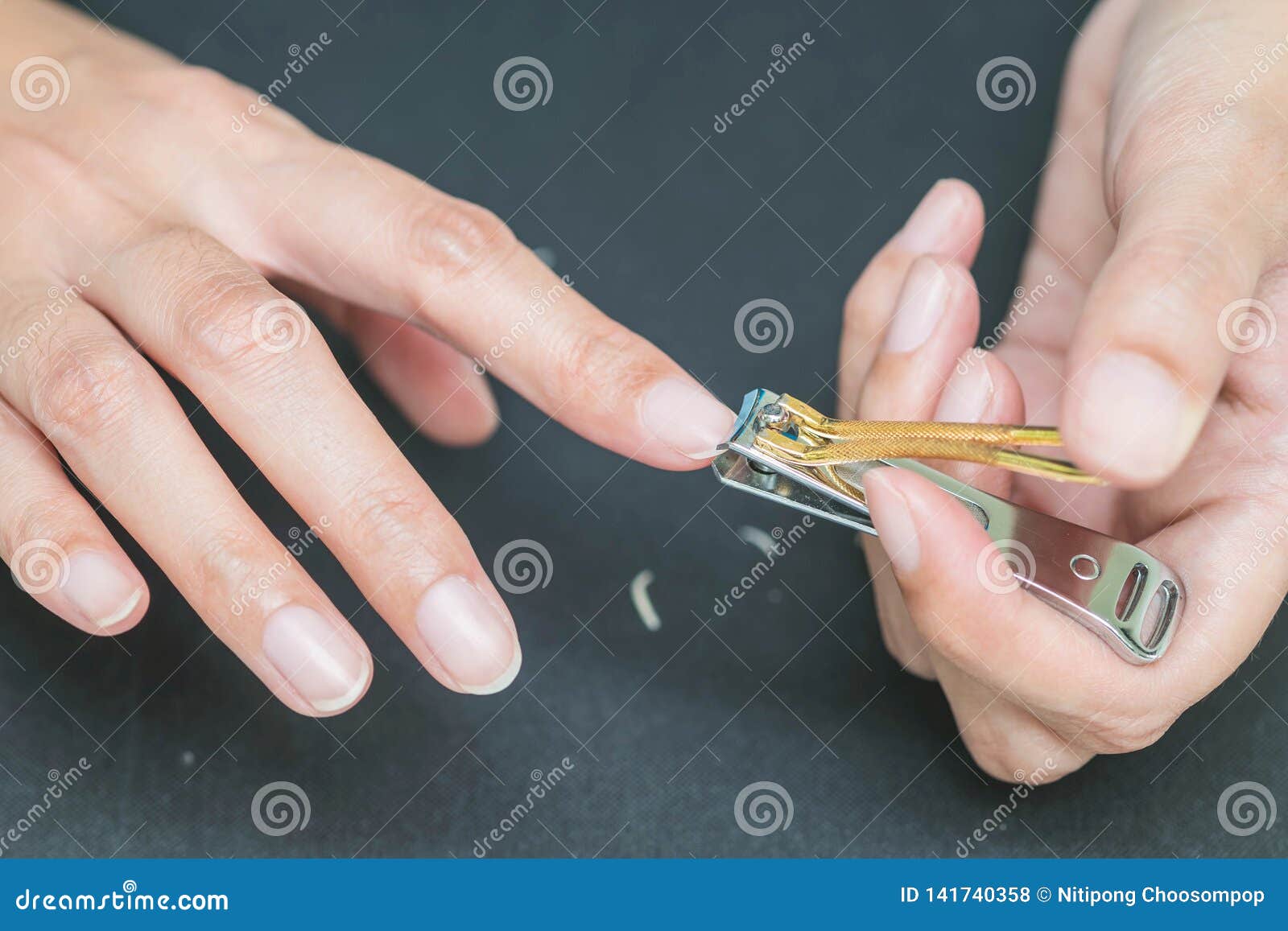 Woman Cutting Fingernails with Nail Scissors Stock Photo - Image of ...