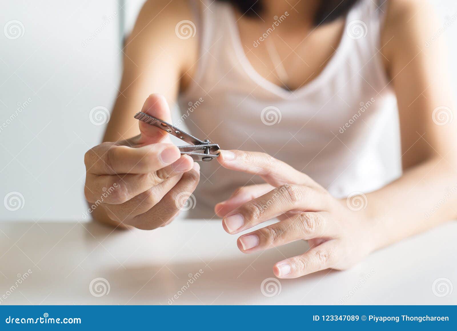 Woman Cutting Nails with Nail Clipper,Female Using Tweezers Close Up Stock  Image - Image of cutter, fingernails: 123347089