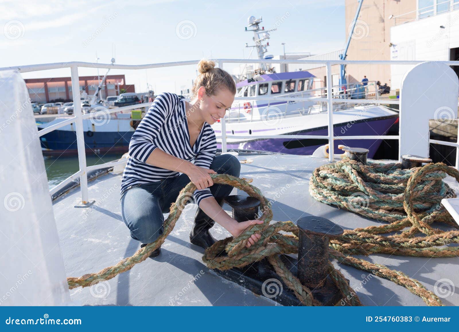 Woman on Deck Boat Attaching Rope Stock Image Image of boat, people