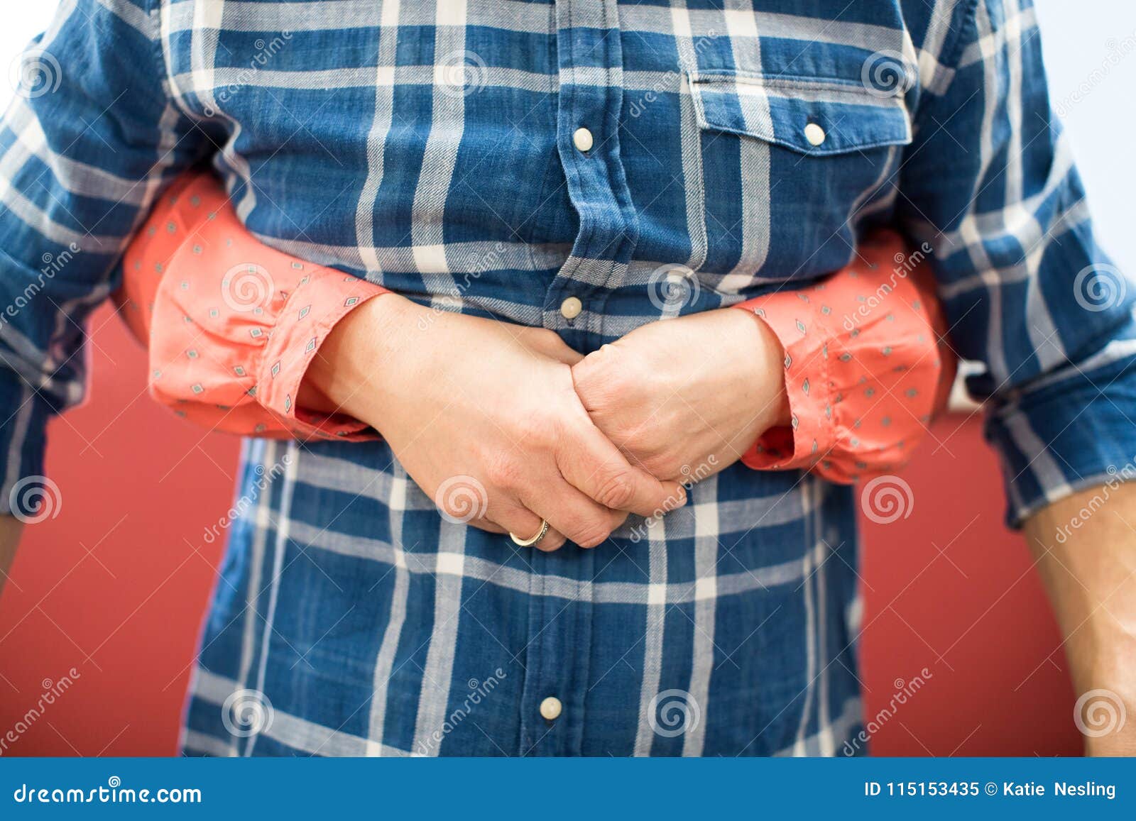 close up of woman demonstrating heimlich maneuver in first aid c