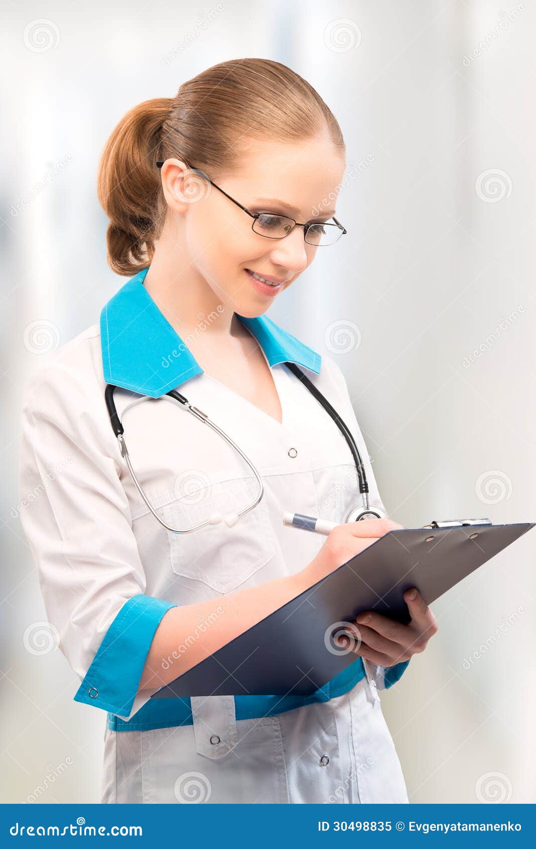 woman doctor with a folder writes medical history