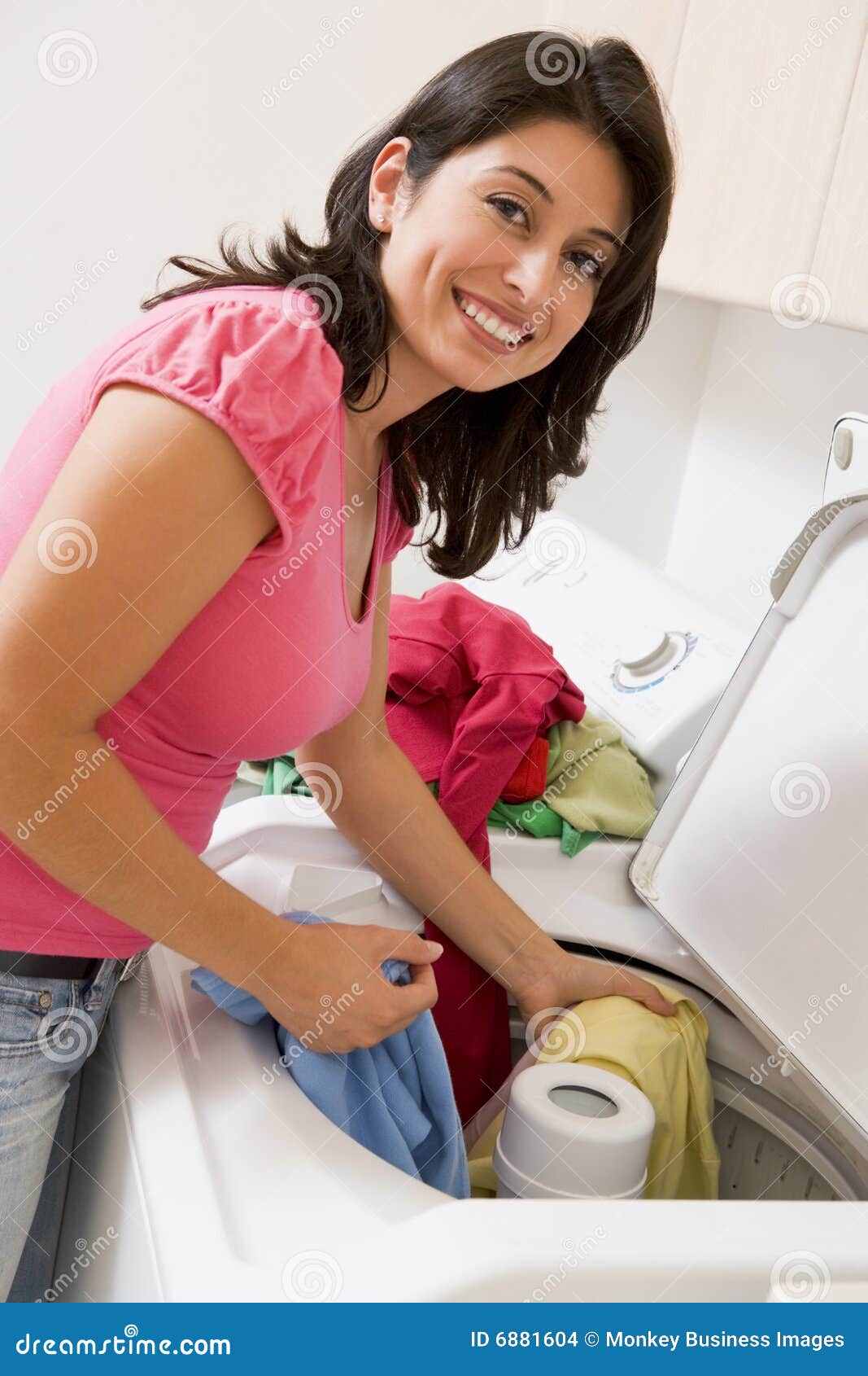 Woman Doing Laundry stock photo. Image of housework, latino 6881604