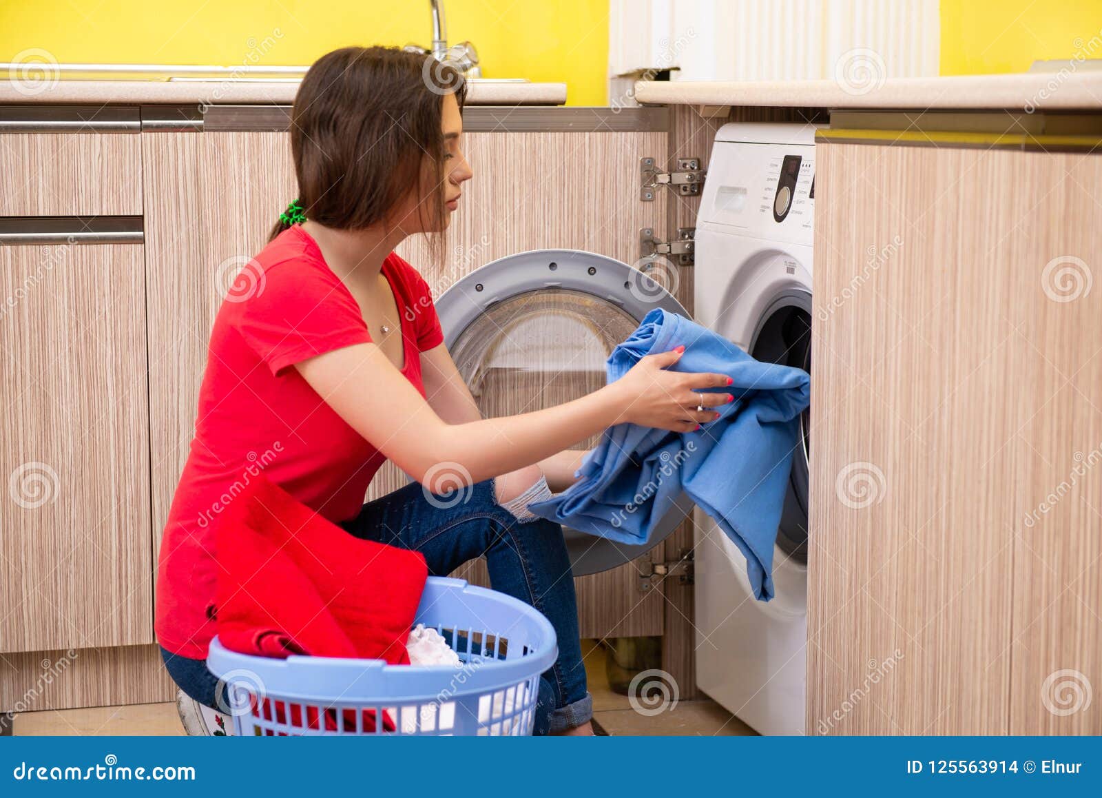 The Woman Doing Laundry at Home Stock Photo Image of dryer, beautiful