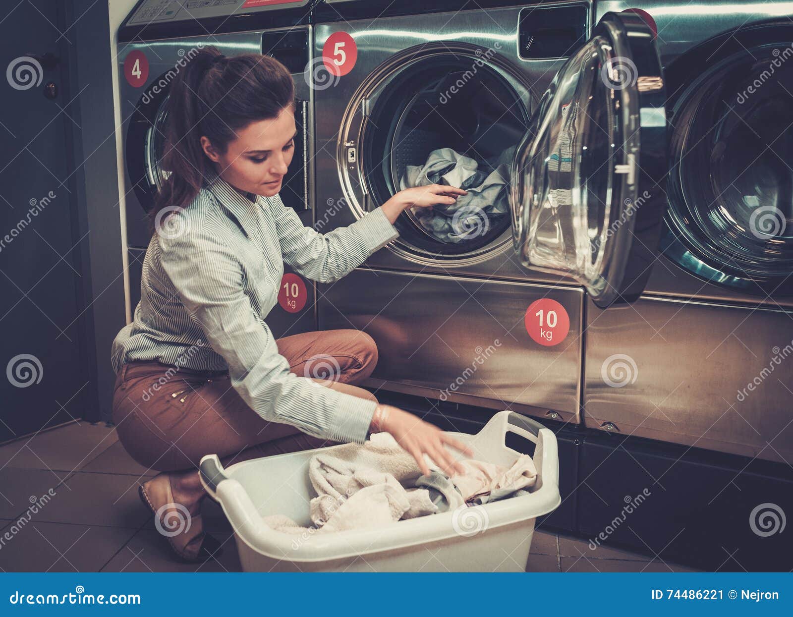 Woman Doing Laundry at Laundromat Shop. Stock Image Image of indoors