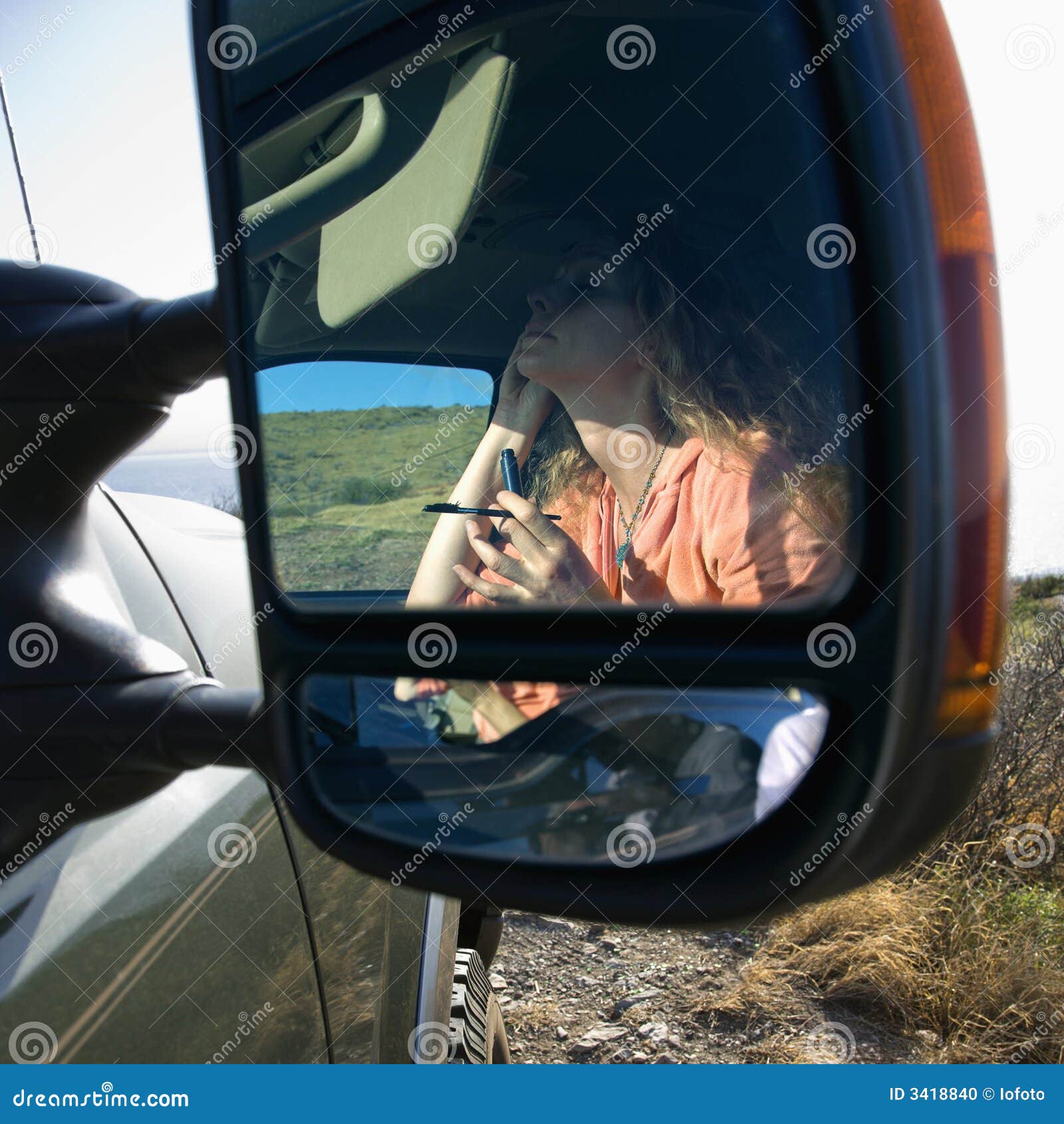 Woman Doing Make Up in Car. Stock Photo - Image of head, grooming: 3418840